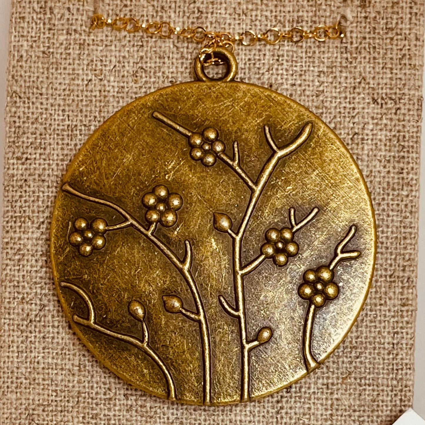 Bronze necklace with hand painted and vitrified round pendant.