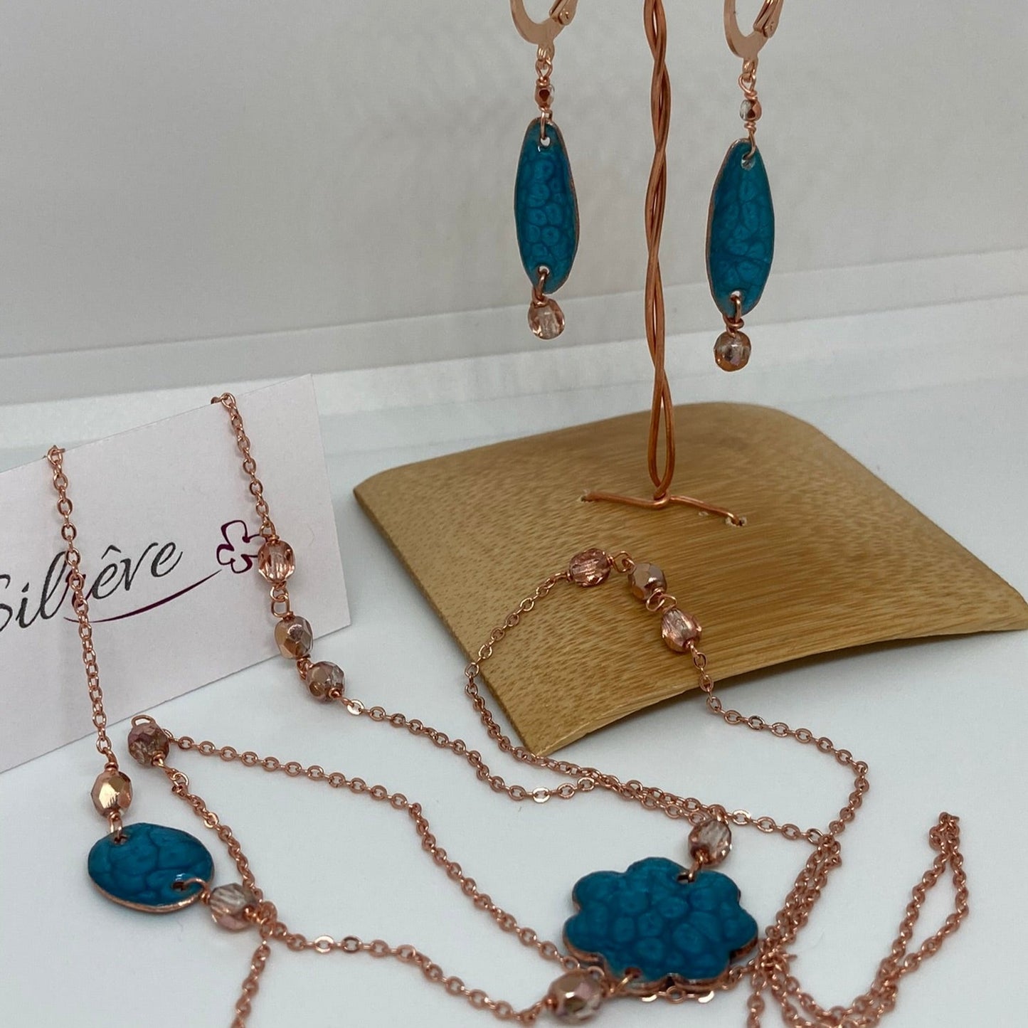 Copper necklace with hand painted and vitrified oval pendant.