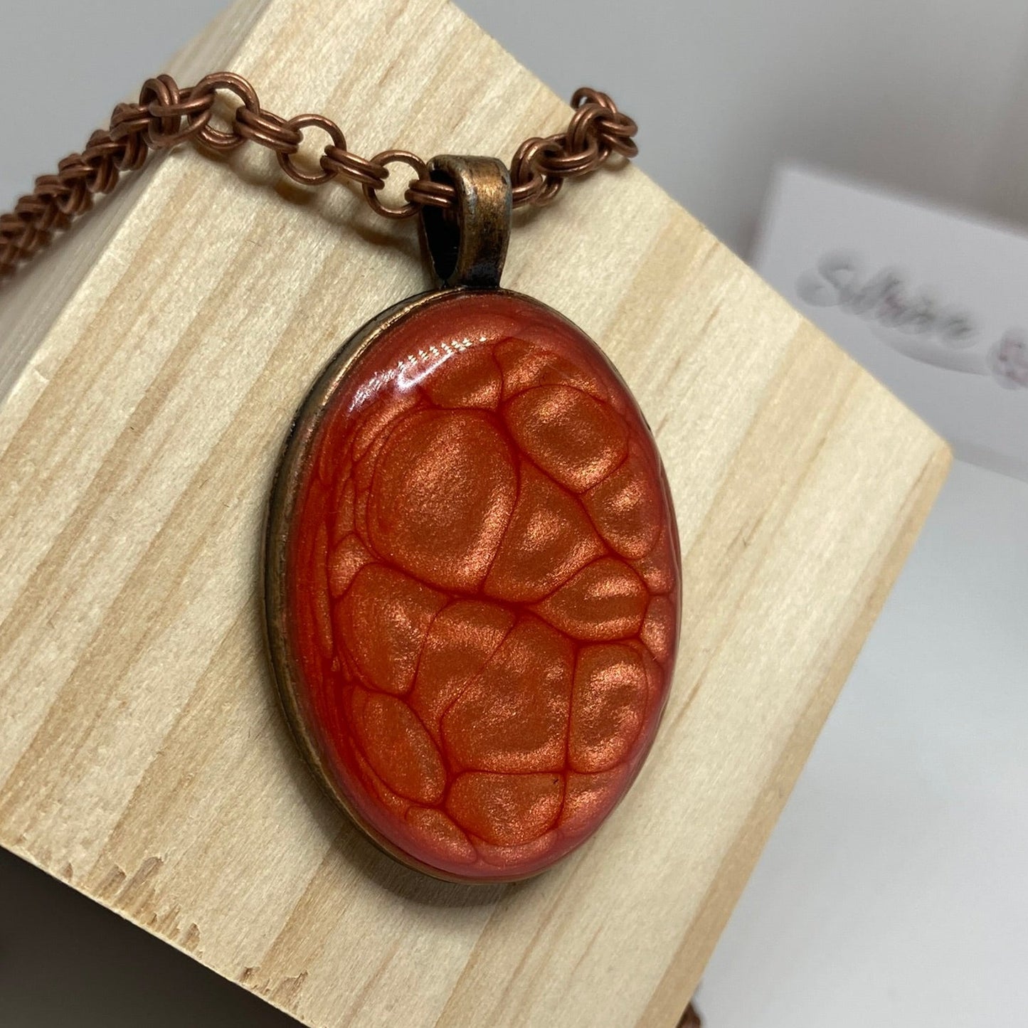 Copper necklace with hand painted and vitrified oval pendant.