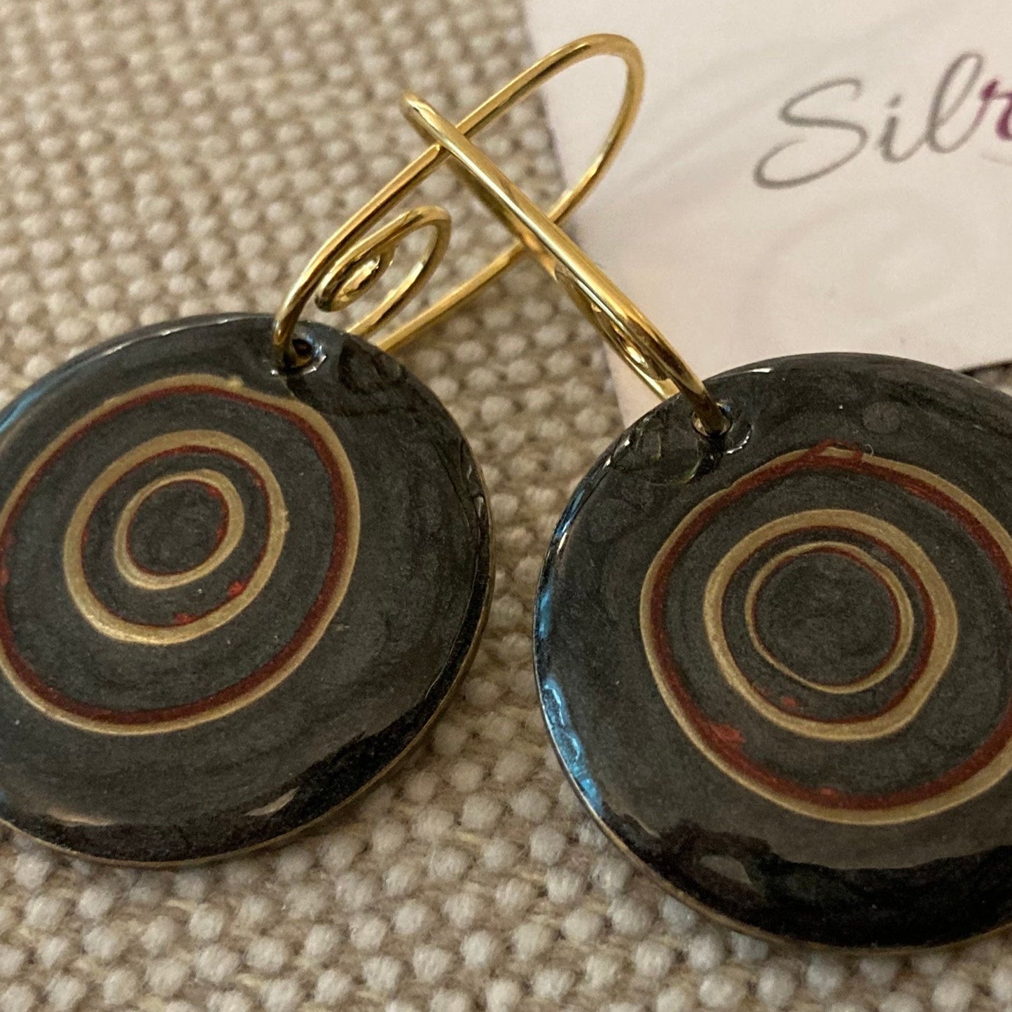 Hand painted pendant earrings on a natural brass base