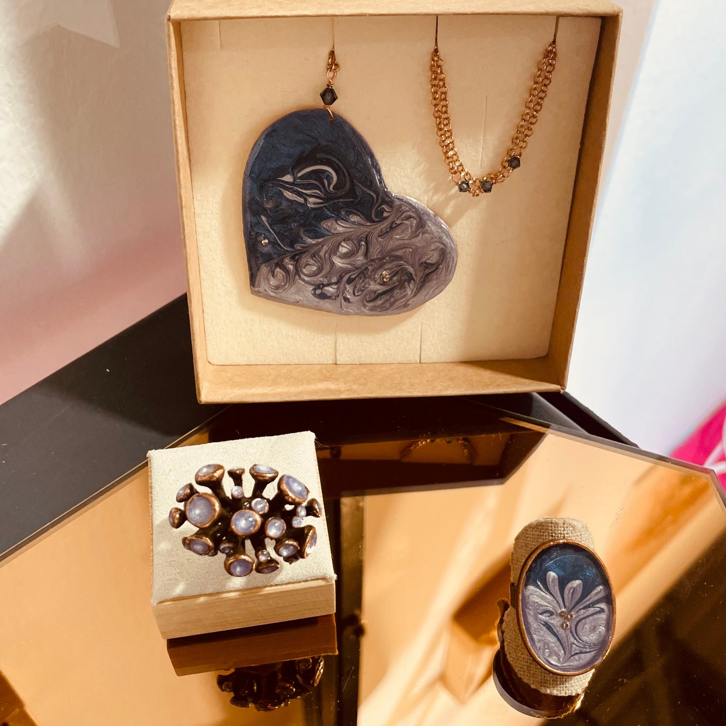 Copper necklace with square pendant, embellished with amethyst pearl.