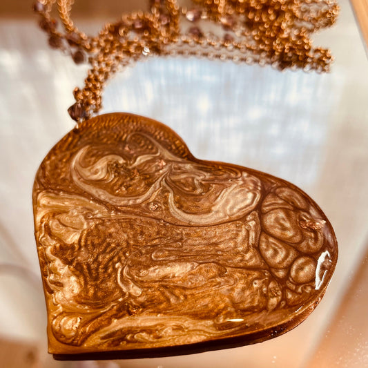 Copper necklace with square pendant, embellished with amethyst pearl.