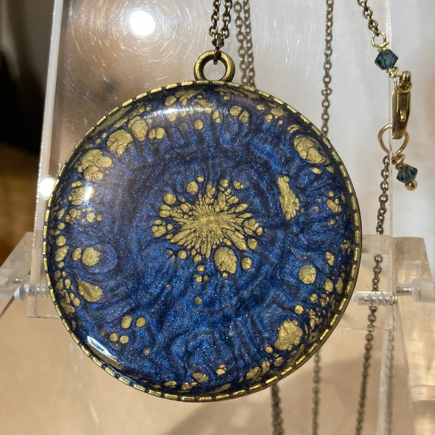 Bronze necklace with hand painted and vitrified round pendant.