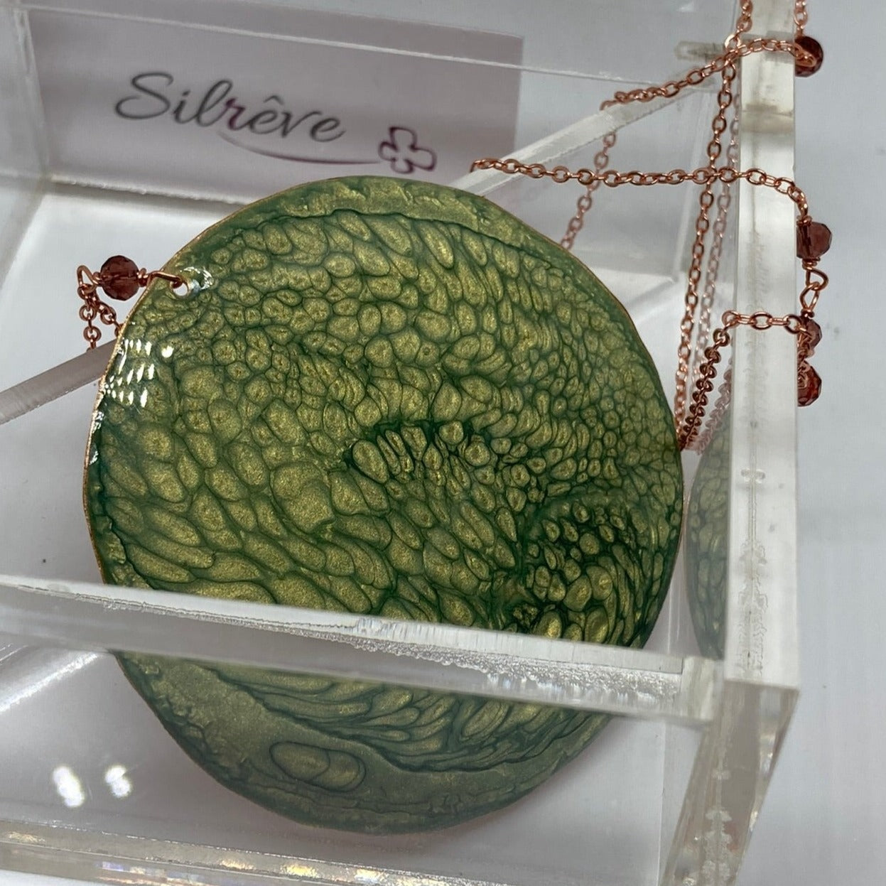 Copper necklace with square pendant, embellished with amethyst pearl.