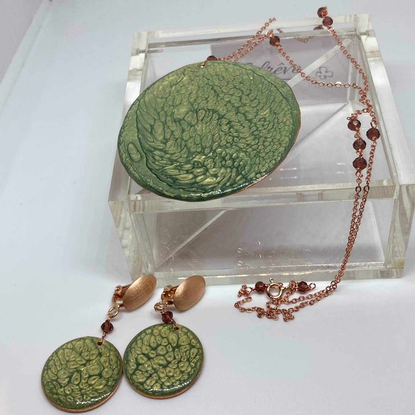 Copper necklace with square pendant, embellished with amethyst pearl.