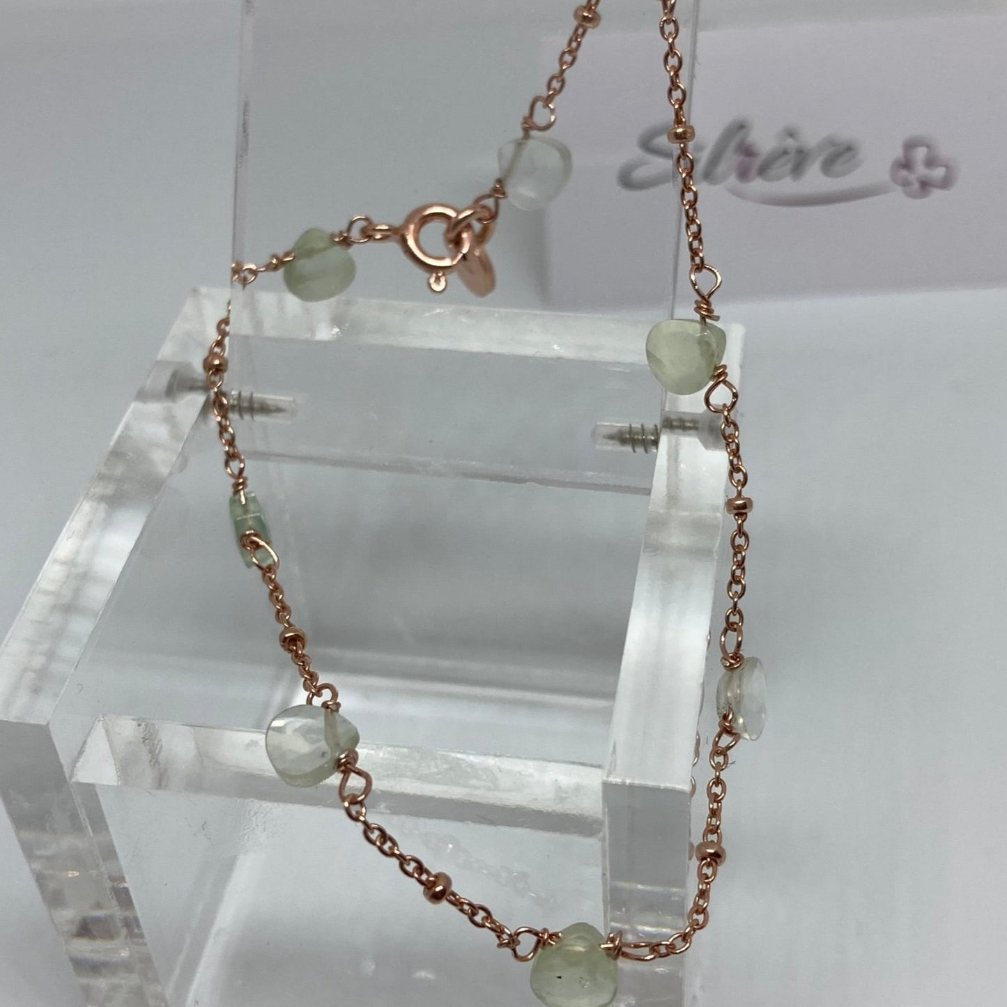 Goldsmith's knot bracelet in Ag. 925, embellished with small colored crystals.