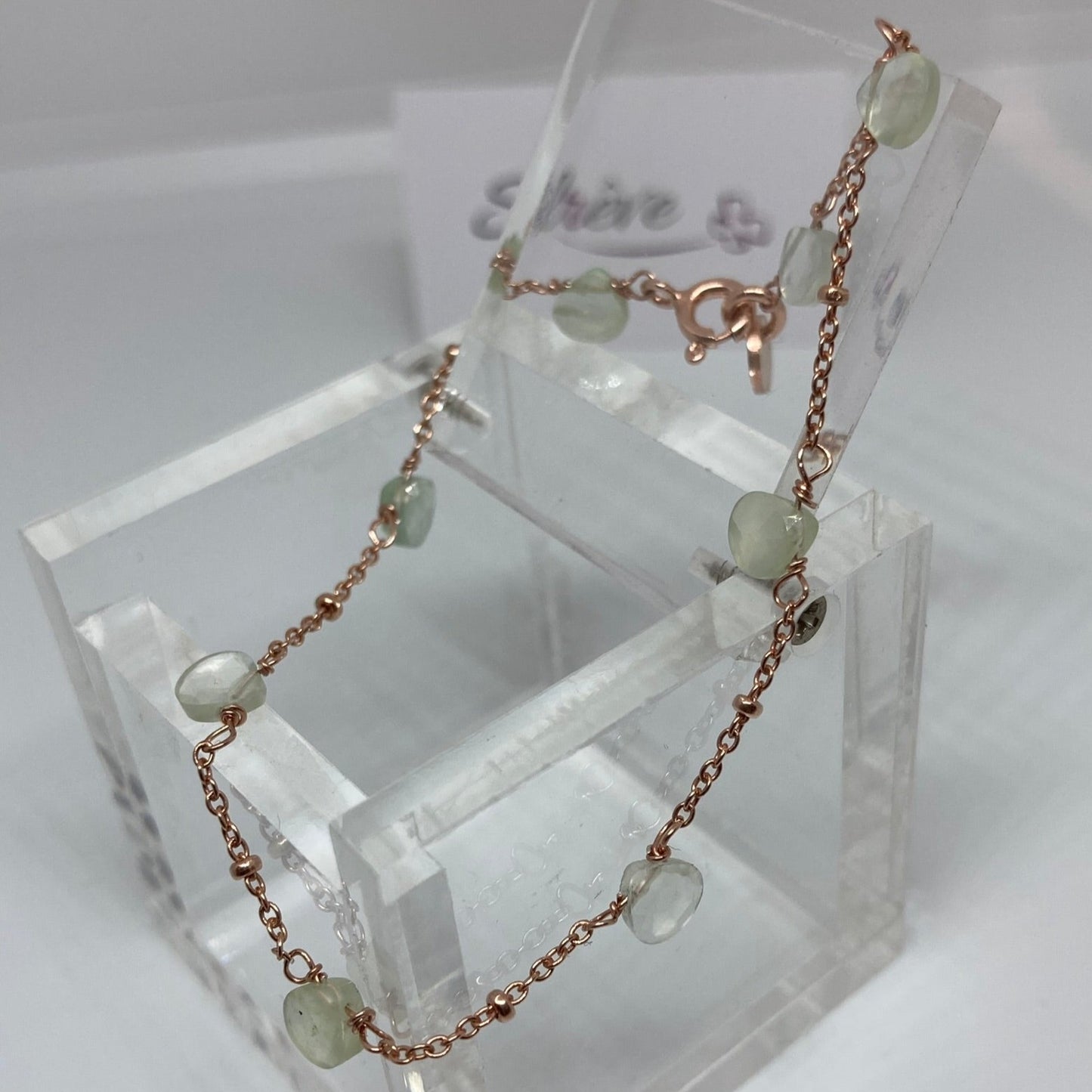 Goldsmith's knot bracelet in Ag. 925, embellished with small colored crystals.