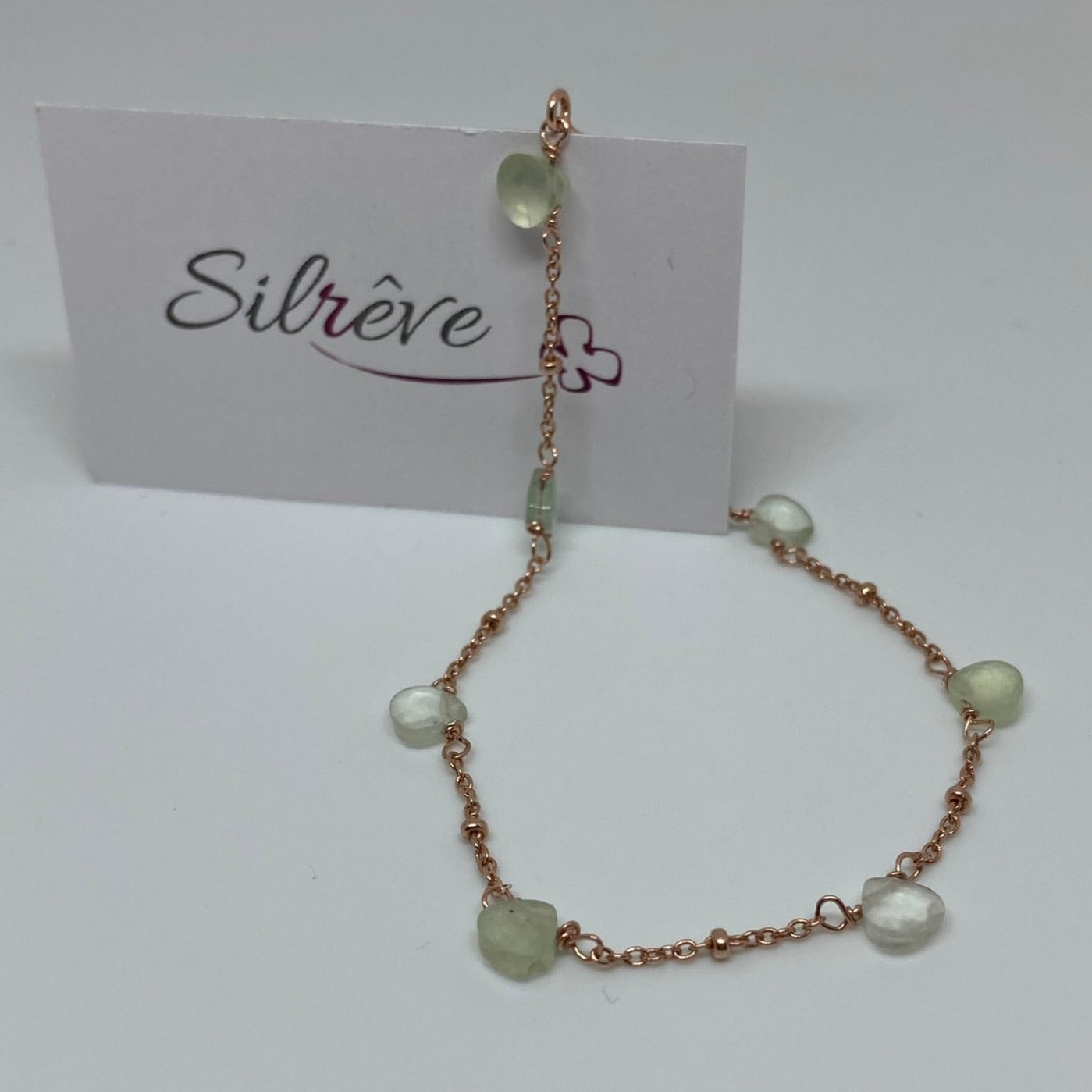 Goldsmith's knot bracelet in Ag. 925, embellished with small colored crystals.