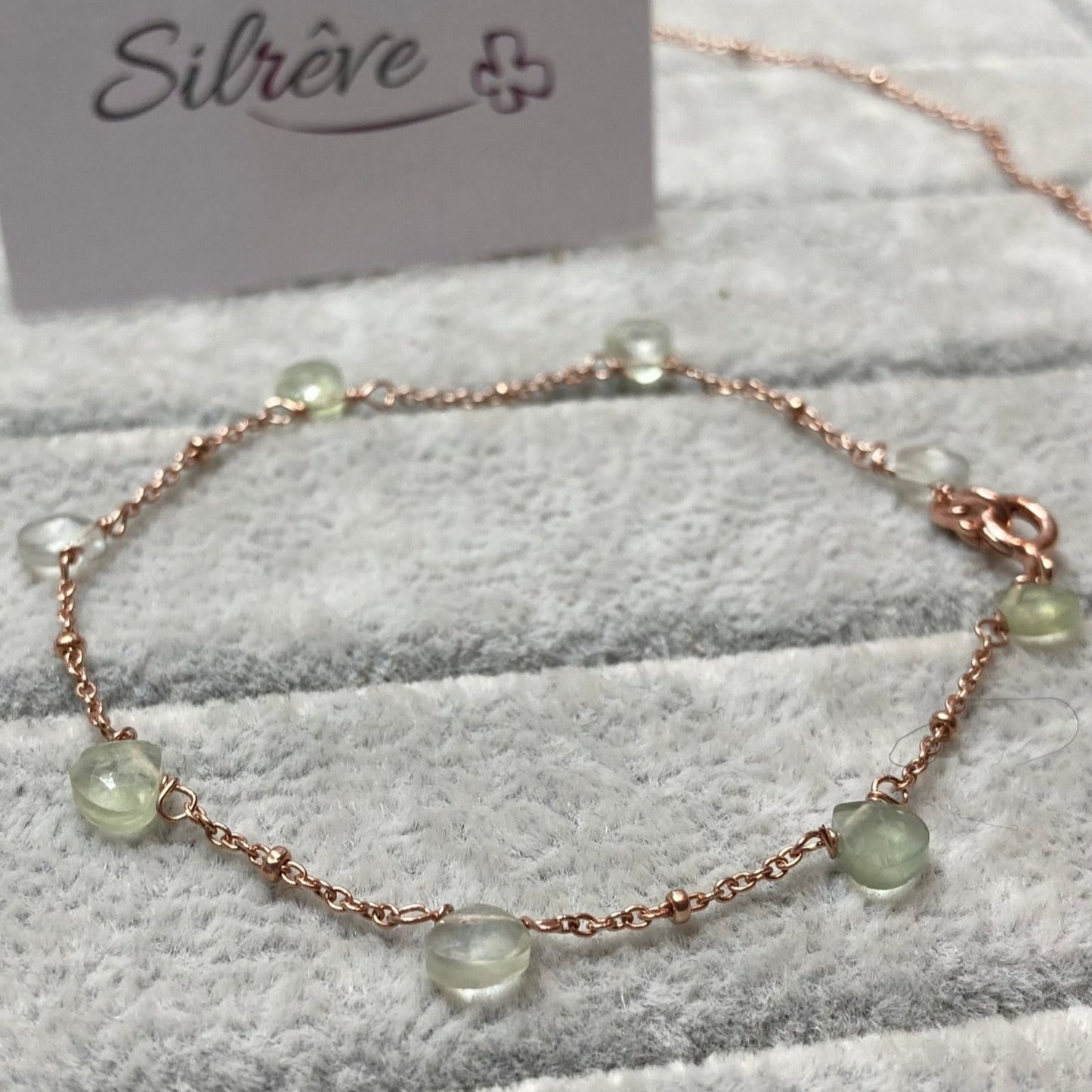 Goldsmith's knot bracelet in Ag. 925, embellished with small colored crystals.