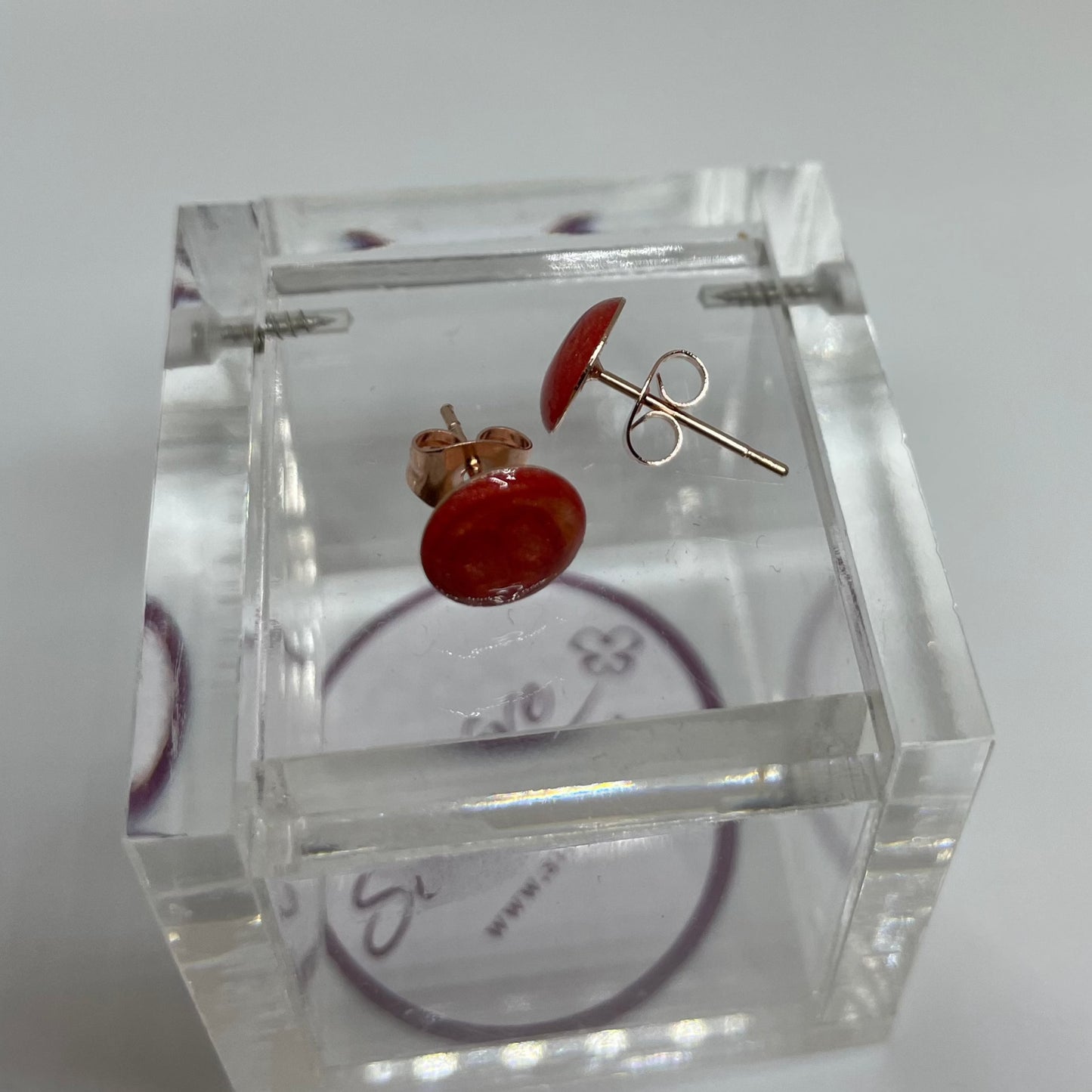 Orecchini  a puntino in ottone rosato