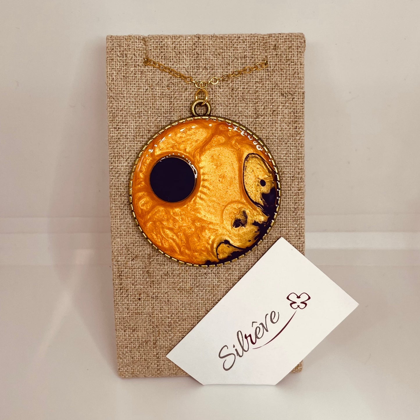 Bronze necklace with hand painted and vitrified round pendant.