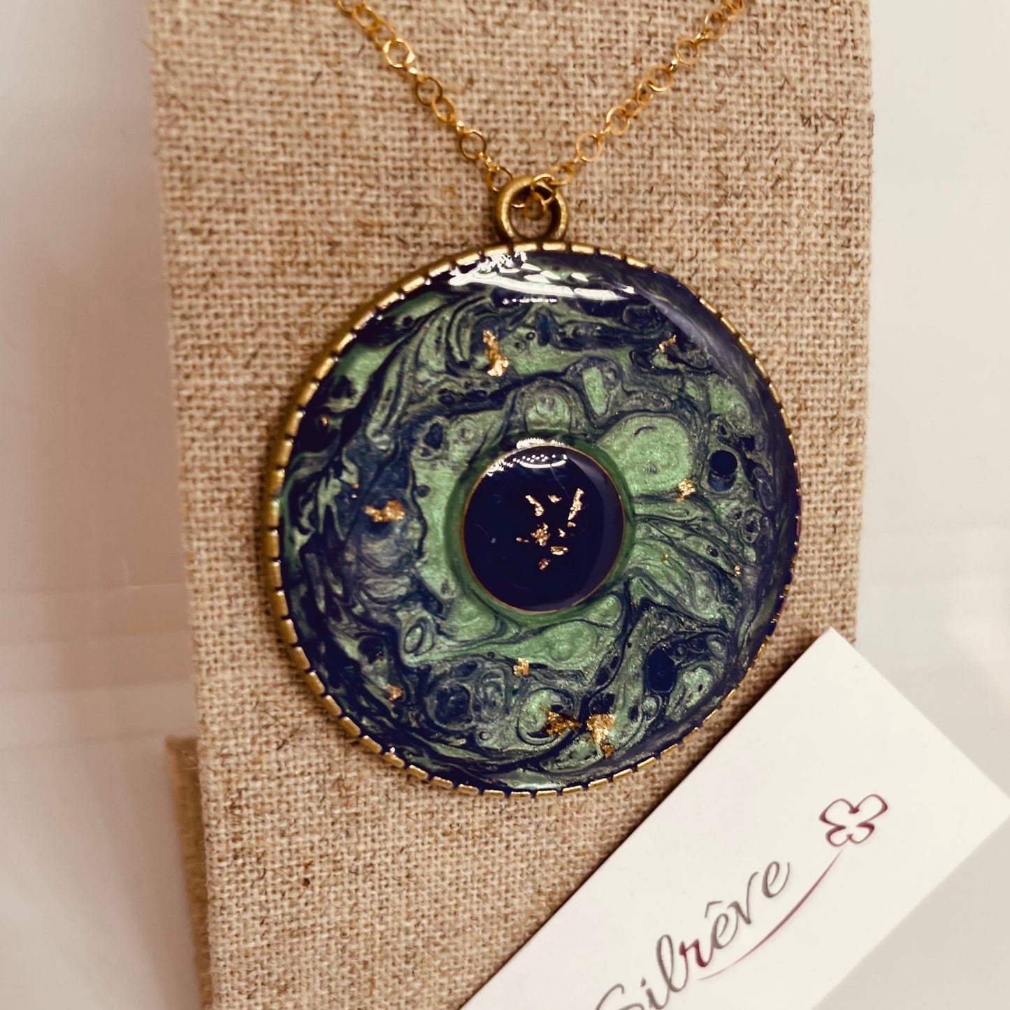 Bronze necklace with hand painted and vitrified round pendant.