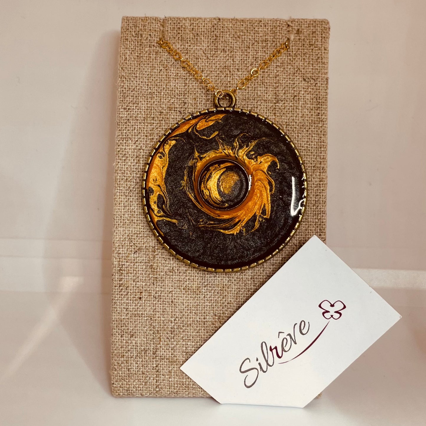 Bronze necklace with hand painted and vitrified round pendant.