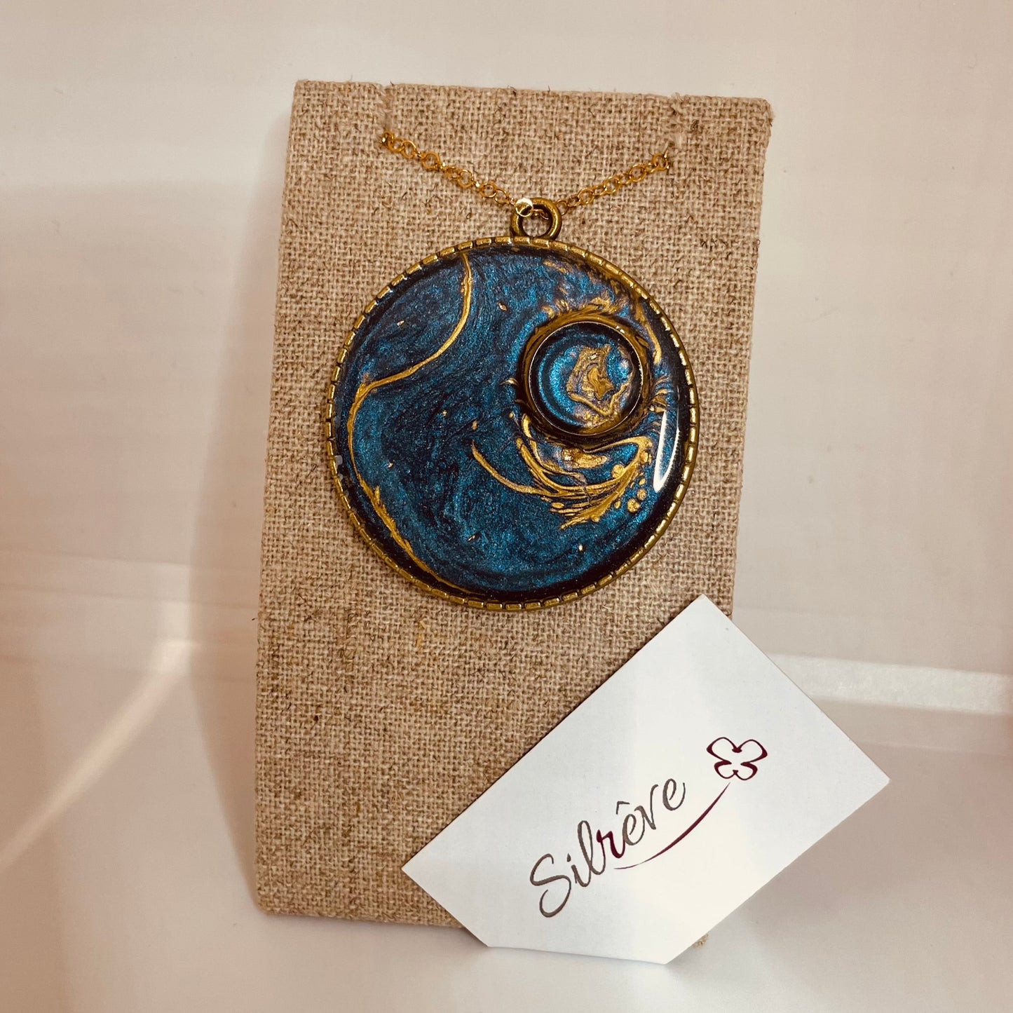 Bronze necklace with hand painted and vitrified round pendant.