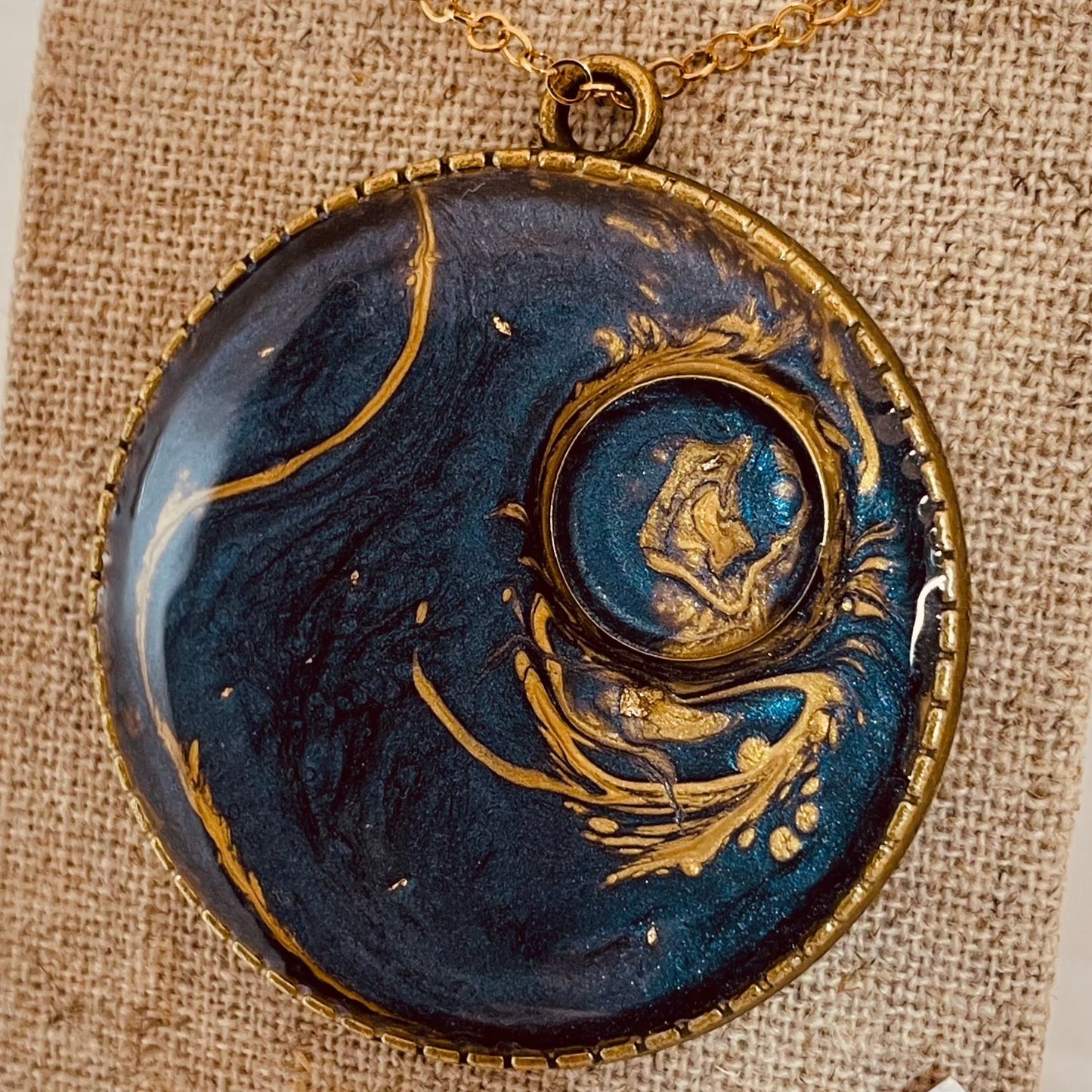 Bronze necklace with hand painted and vitrified round pendant.