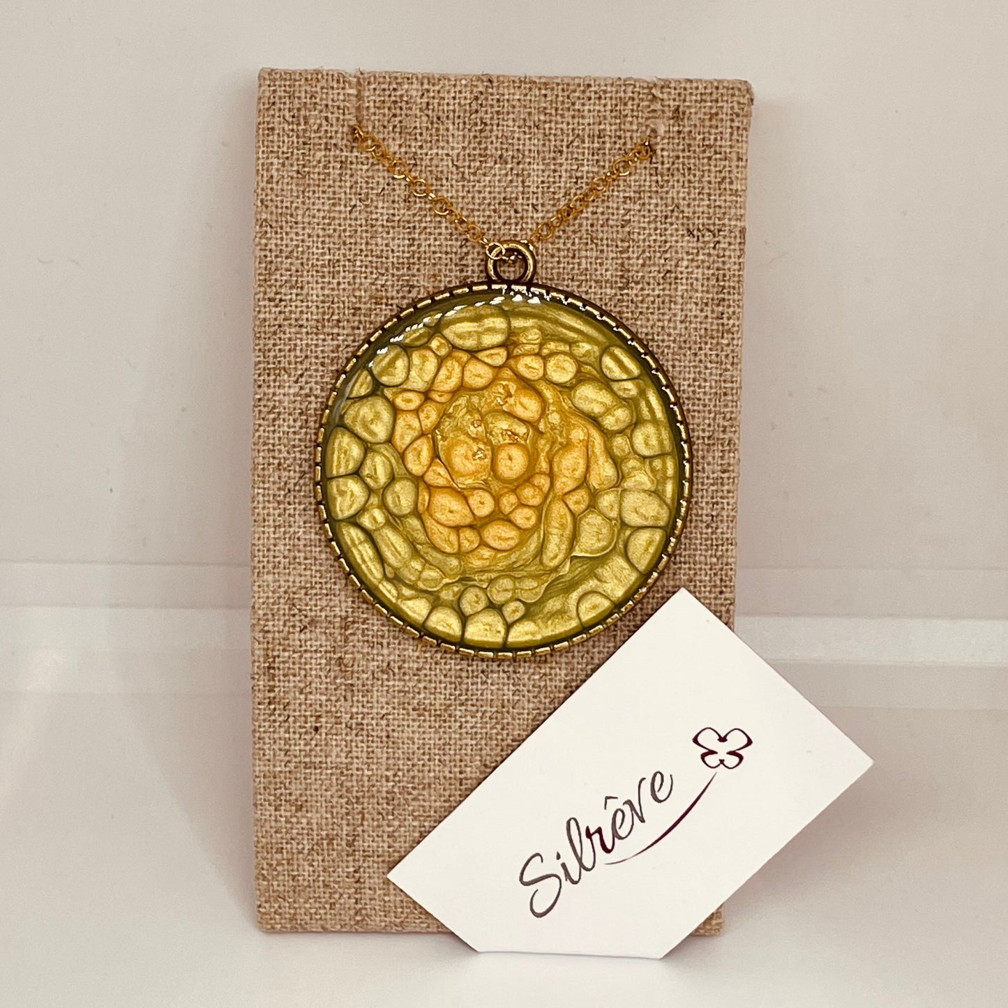 Bronze necklace with hand painted and vitrified round pendant.