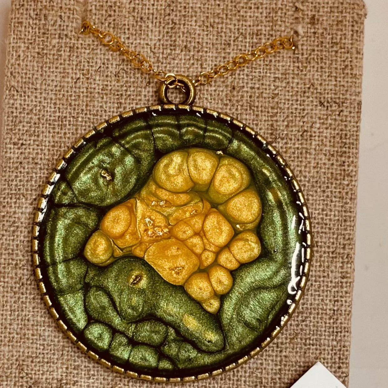 Bronze necklace with hand painted and vitrified round pendant.