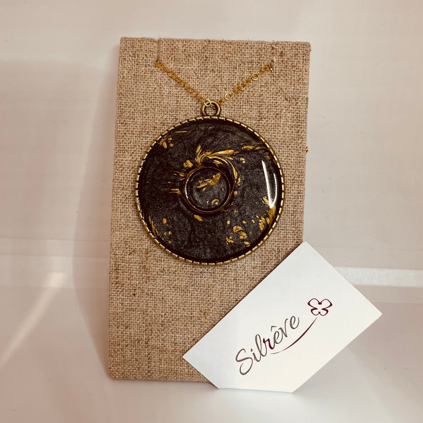 Bronze necklace with hand painted and vitrified round pendant.