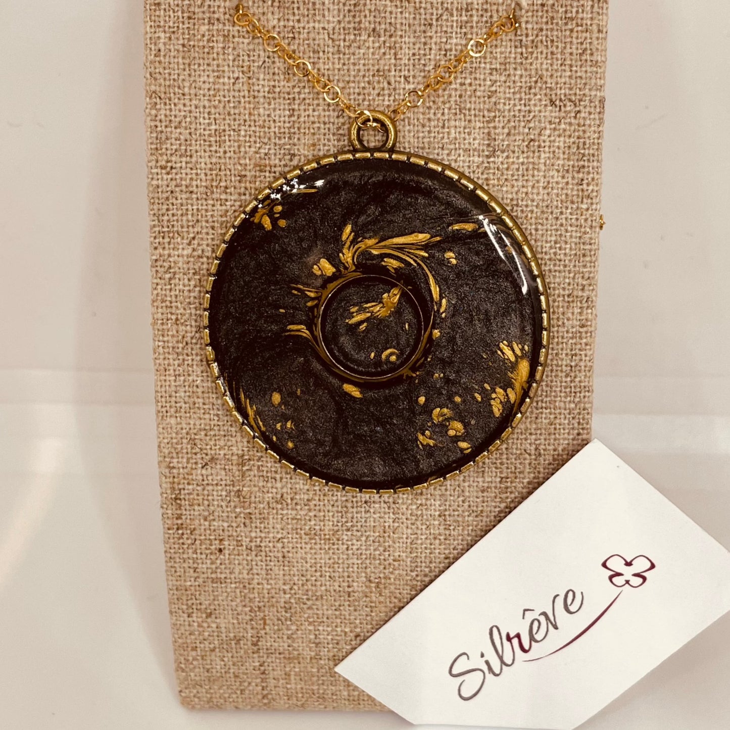 Bronze necklace with hand painted and vitrified round pendant.