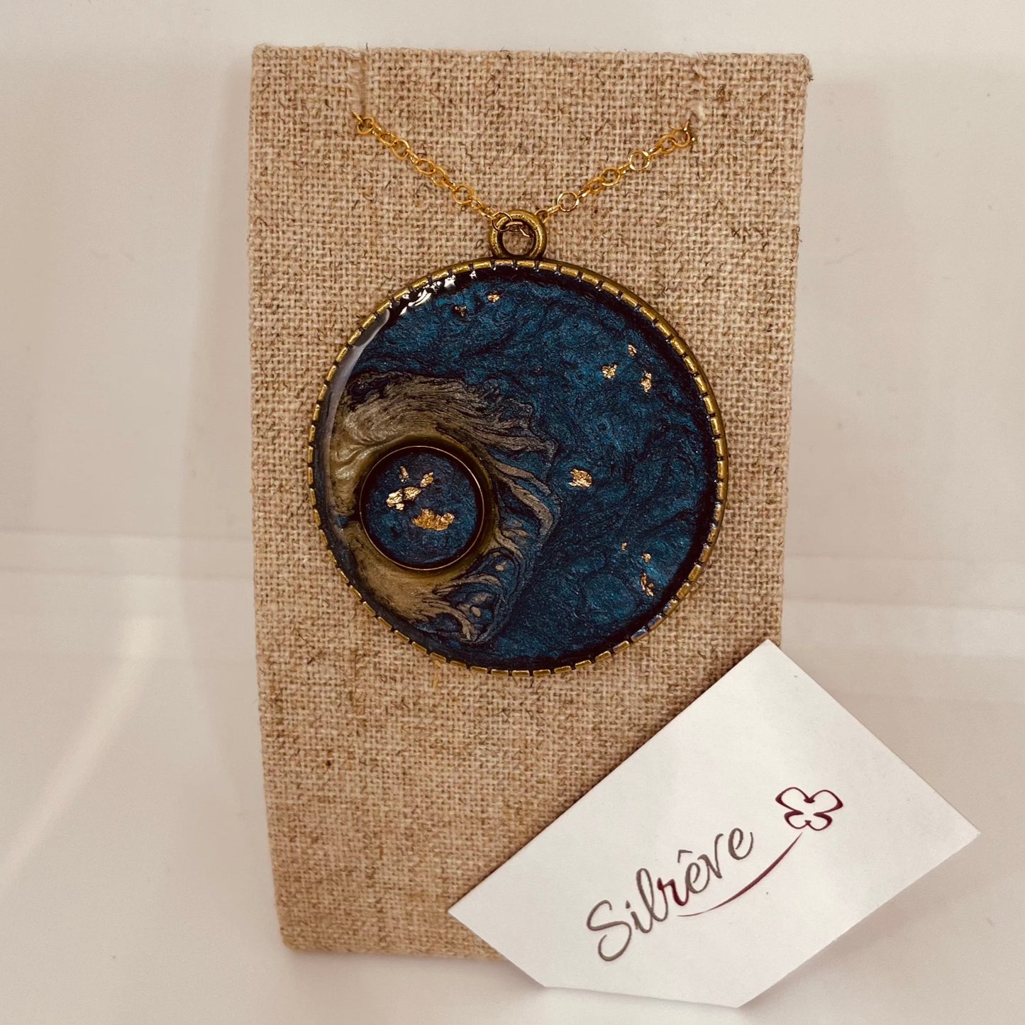 Bronze necklace with hand painted and vitrified round pendant.