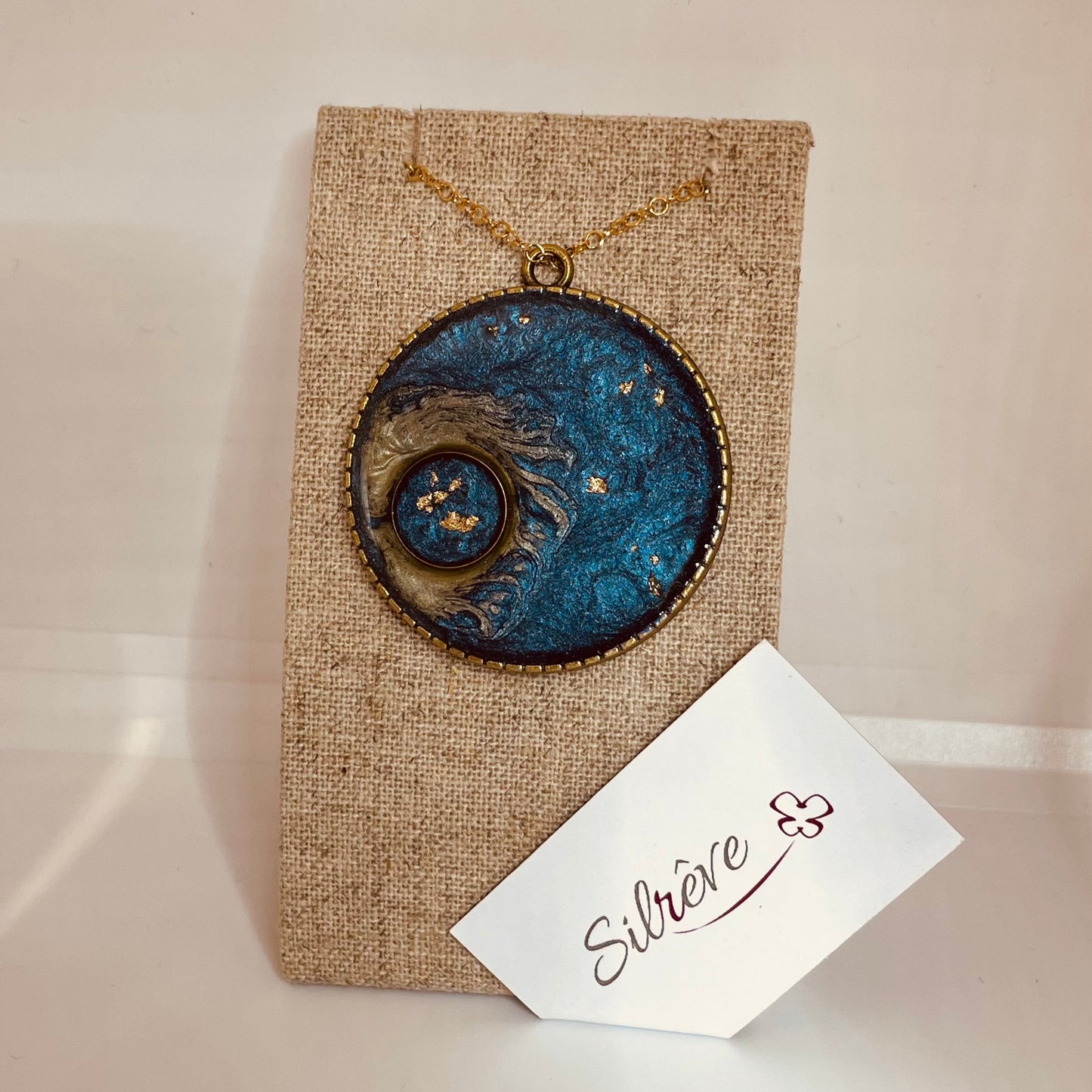 Bronze necklace with hand painted and vitrified round pendant.