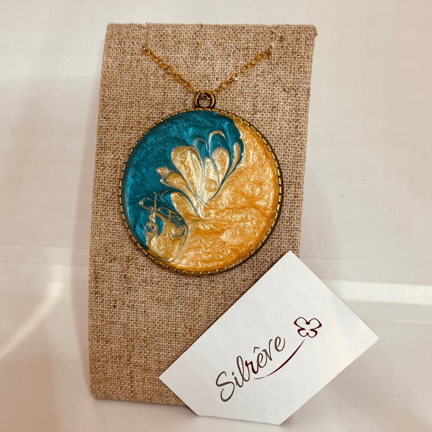 Bronze necklace with hand painted and vitrified round pendant.