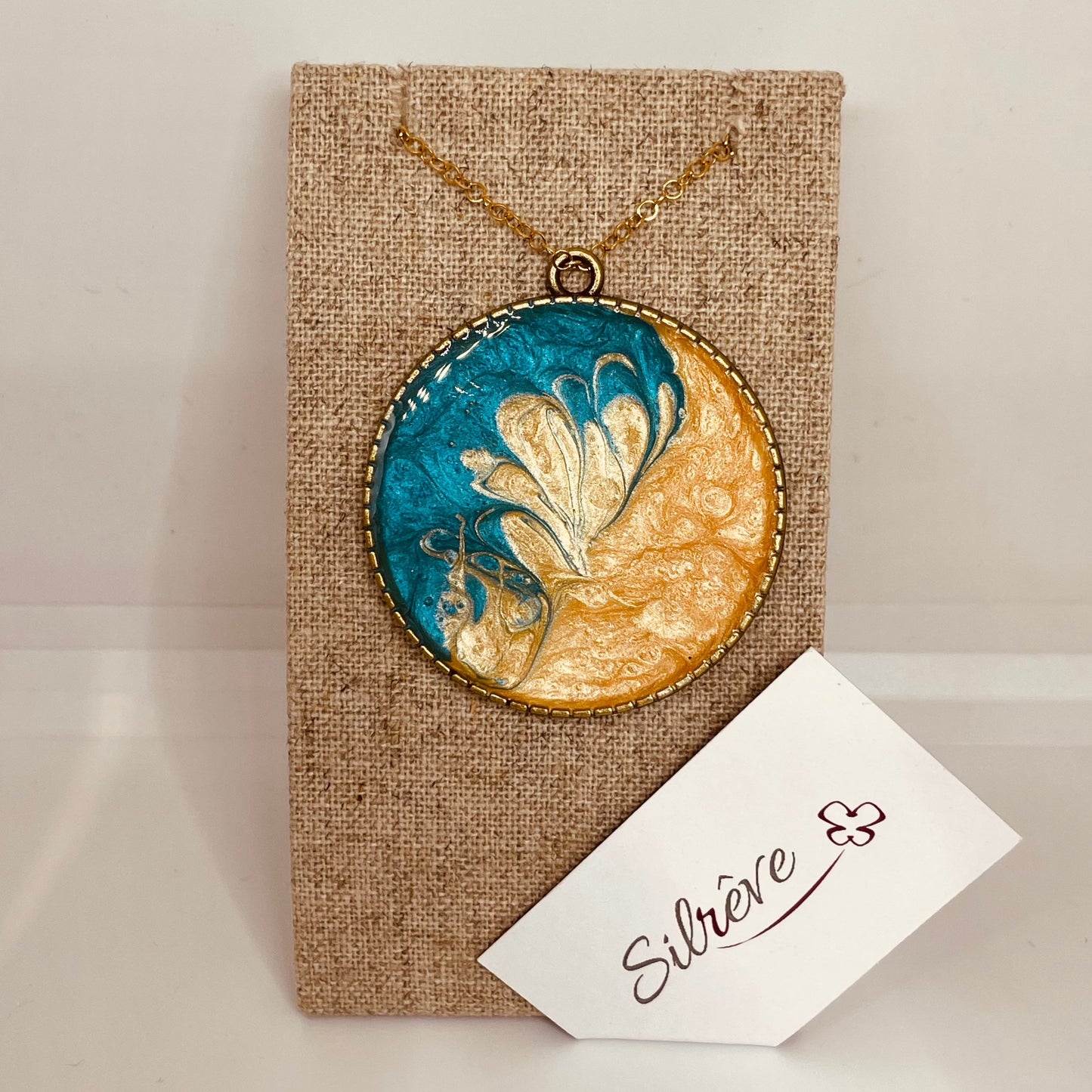 Bronze necklace with hand painted and vitrified round pendant.