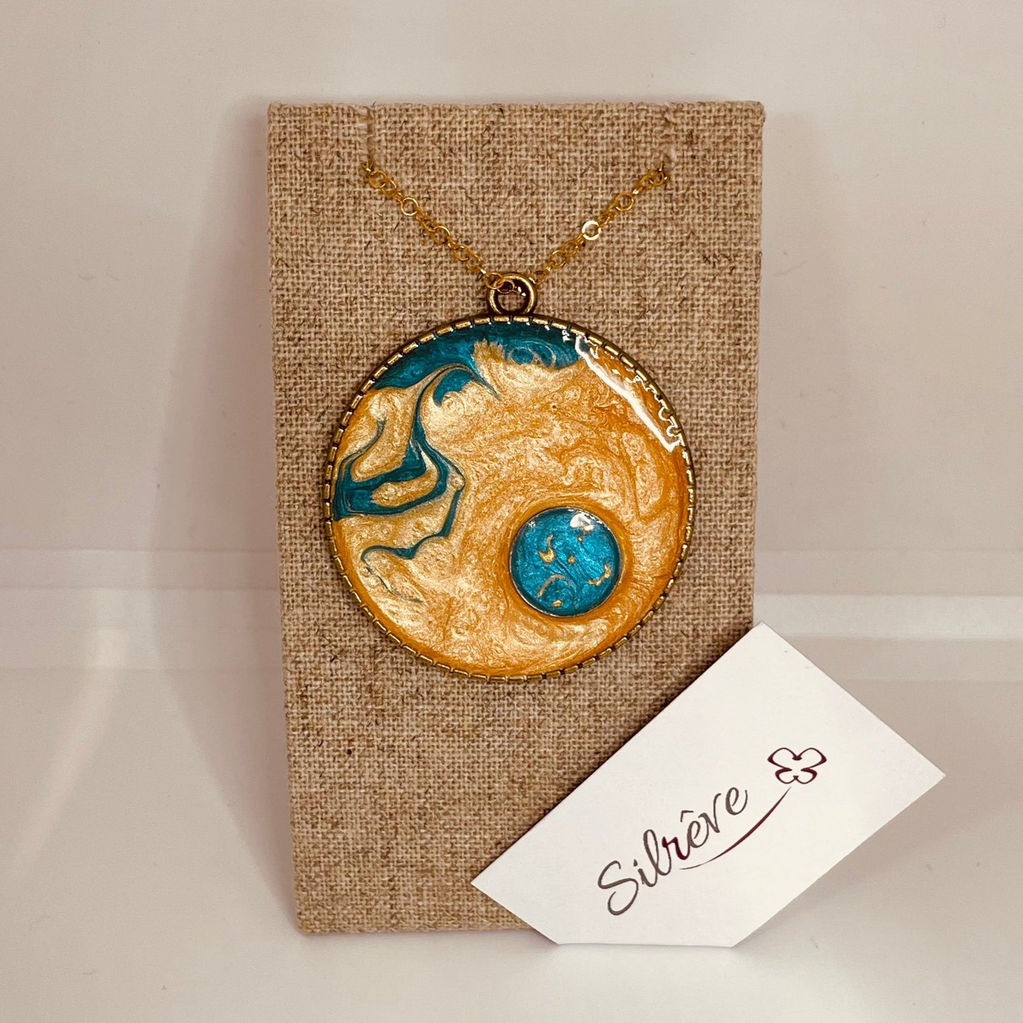 Bronze necklace with hand painted and vitrified round pendant.