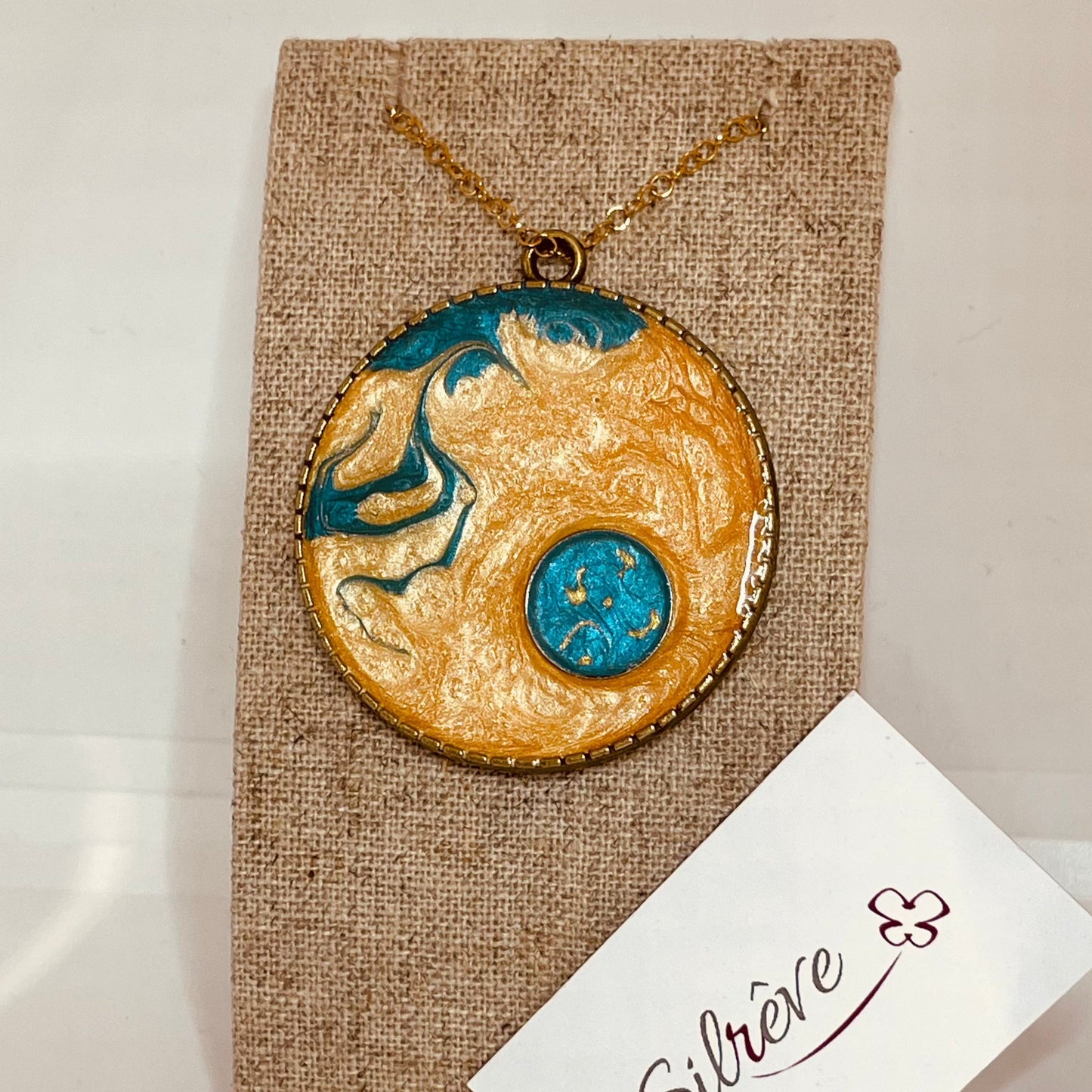 Bronze necklace with hand painted and vitrified round pendant.