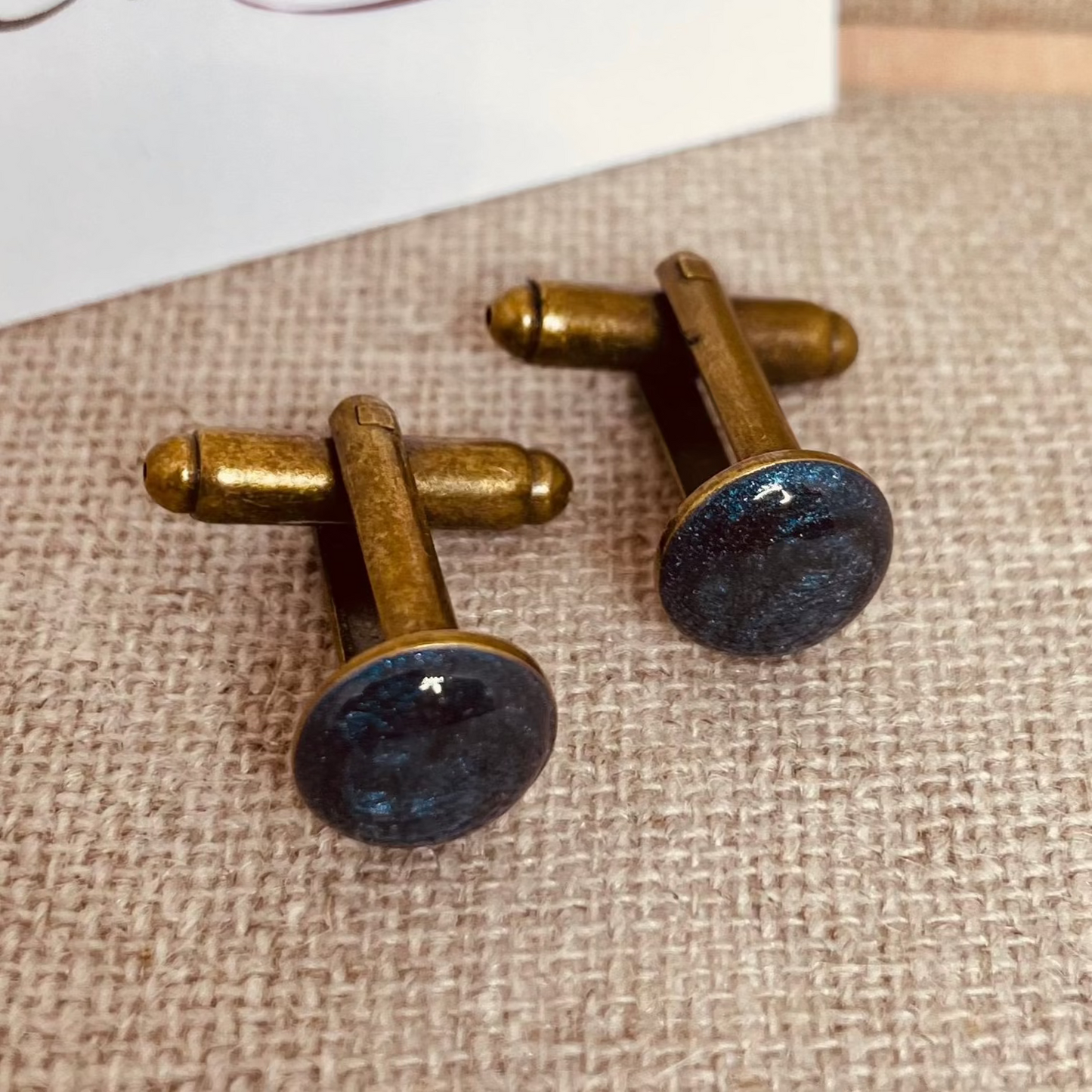 Coppia di gemelli uomo in bronzo