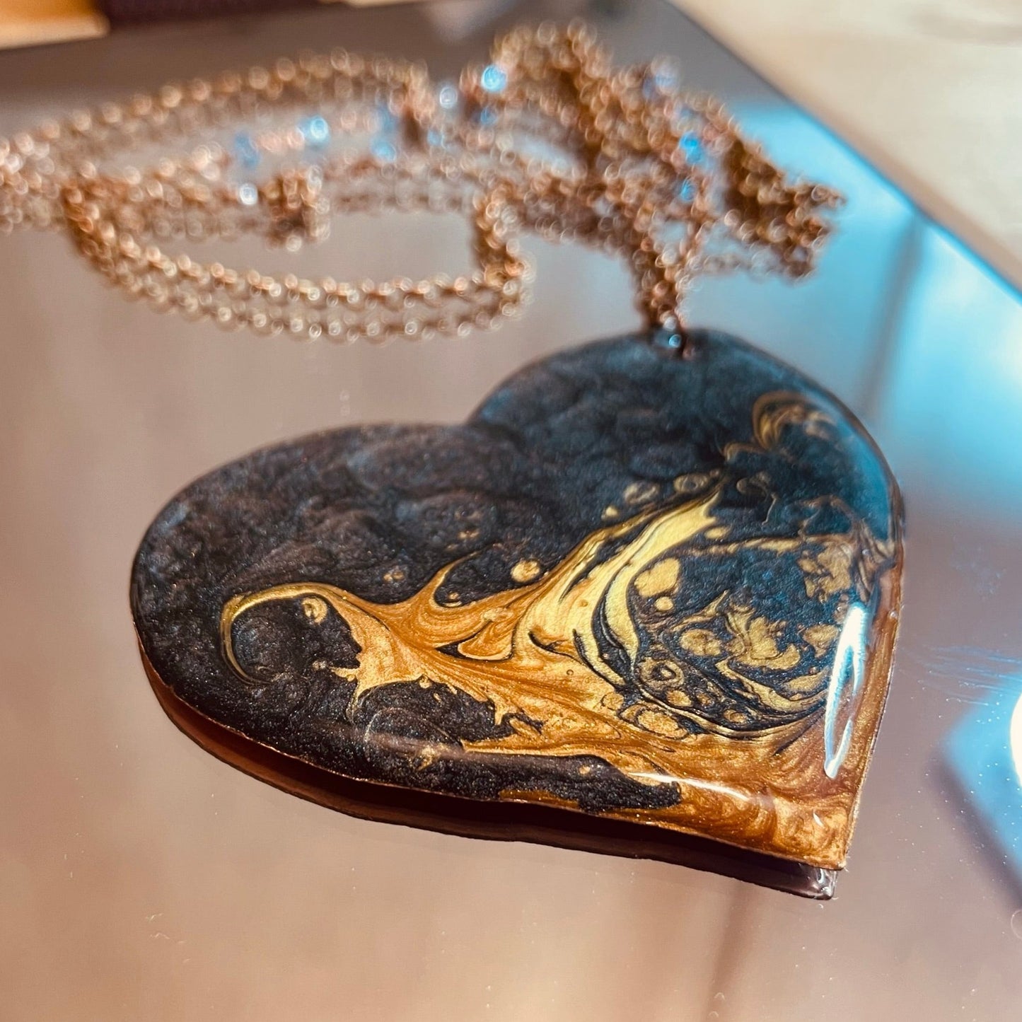 Copper necklace with square pendant, embellished with amethyst pearl.