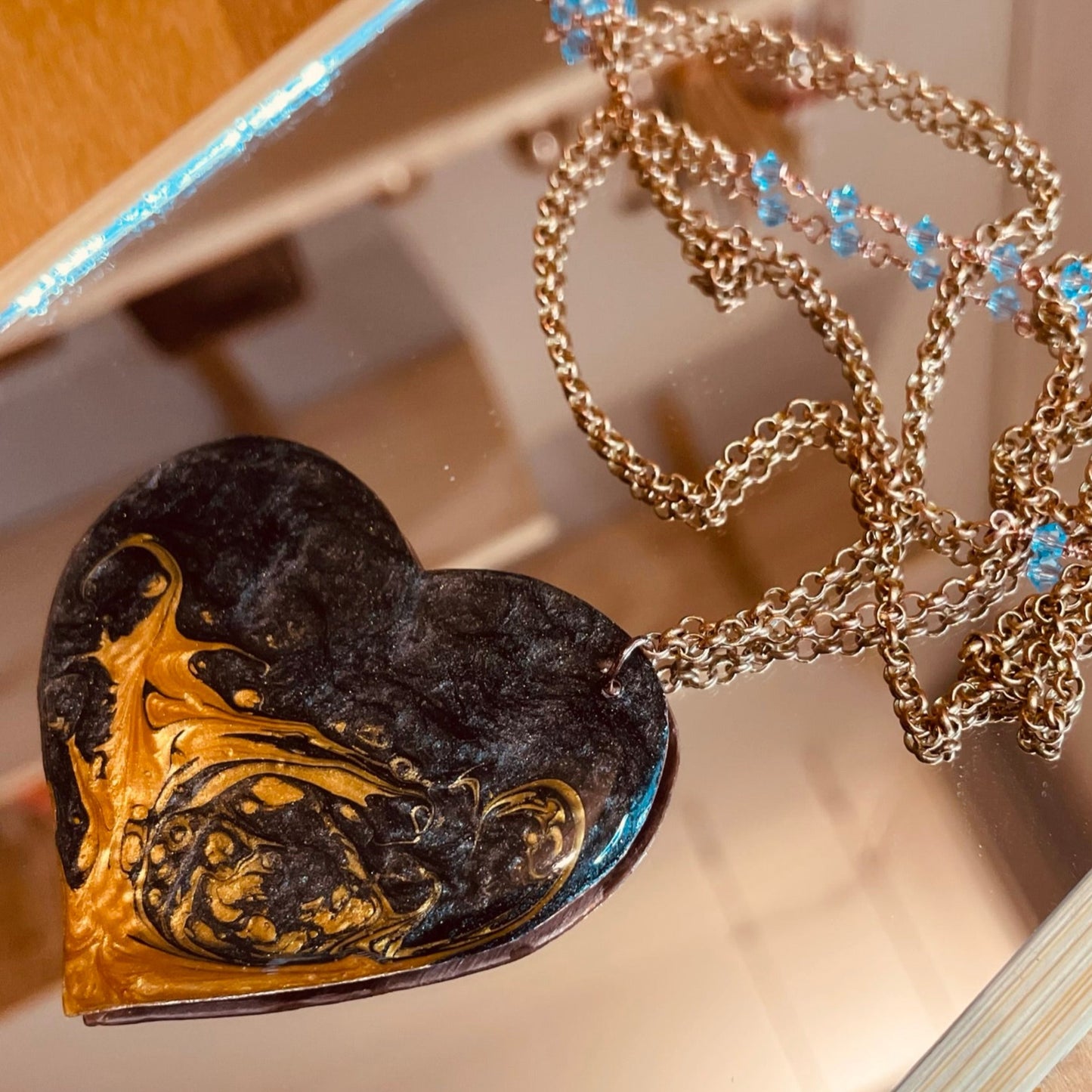 Copper necklace with square pendant, embellished with amethyst pearl.