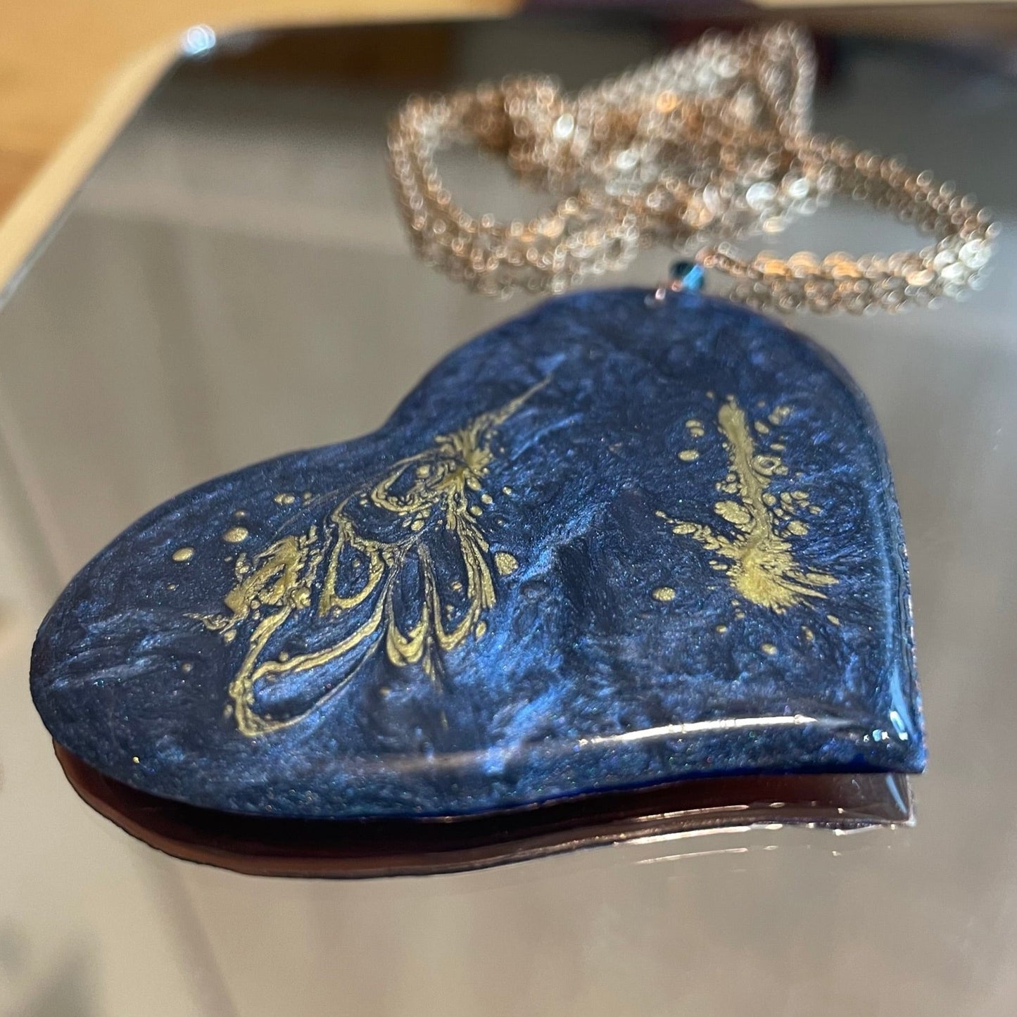 Copper necklace with square pendant, embellished with amethyst pearl.