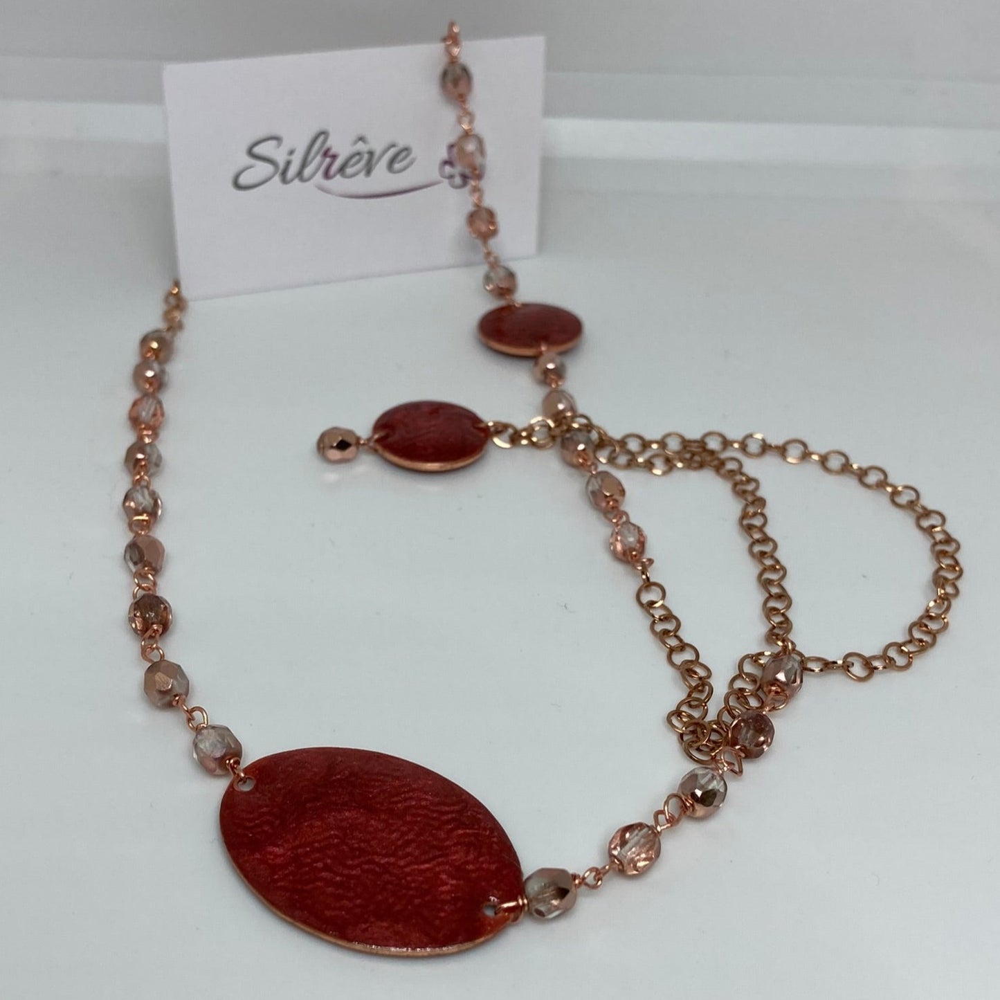 Copper necklace with hand painted and vitrified oval pendant.