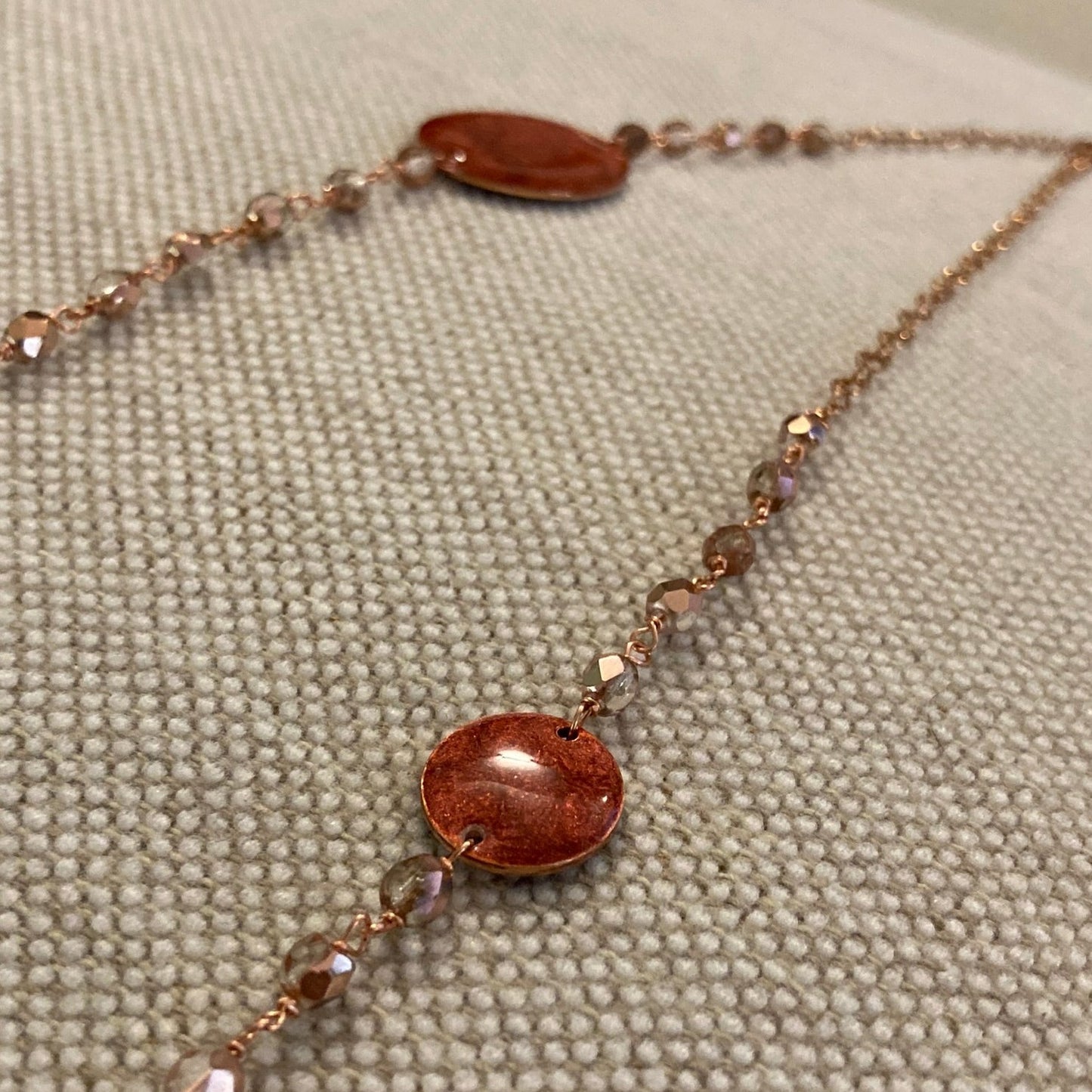 Copper necklace with hand painted and vitrified oval pendant.