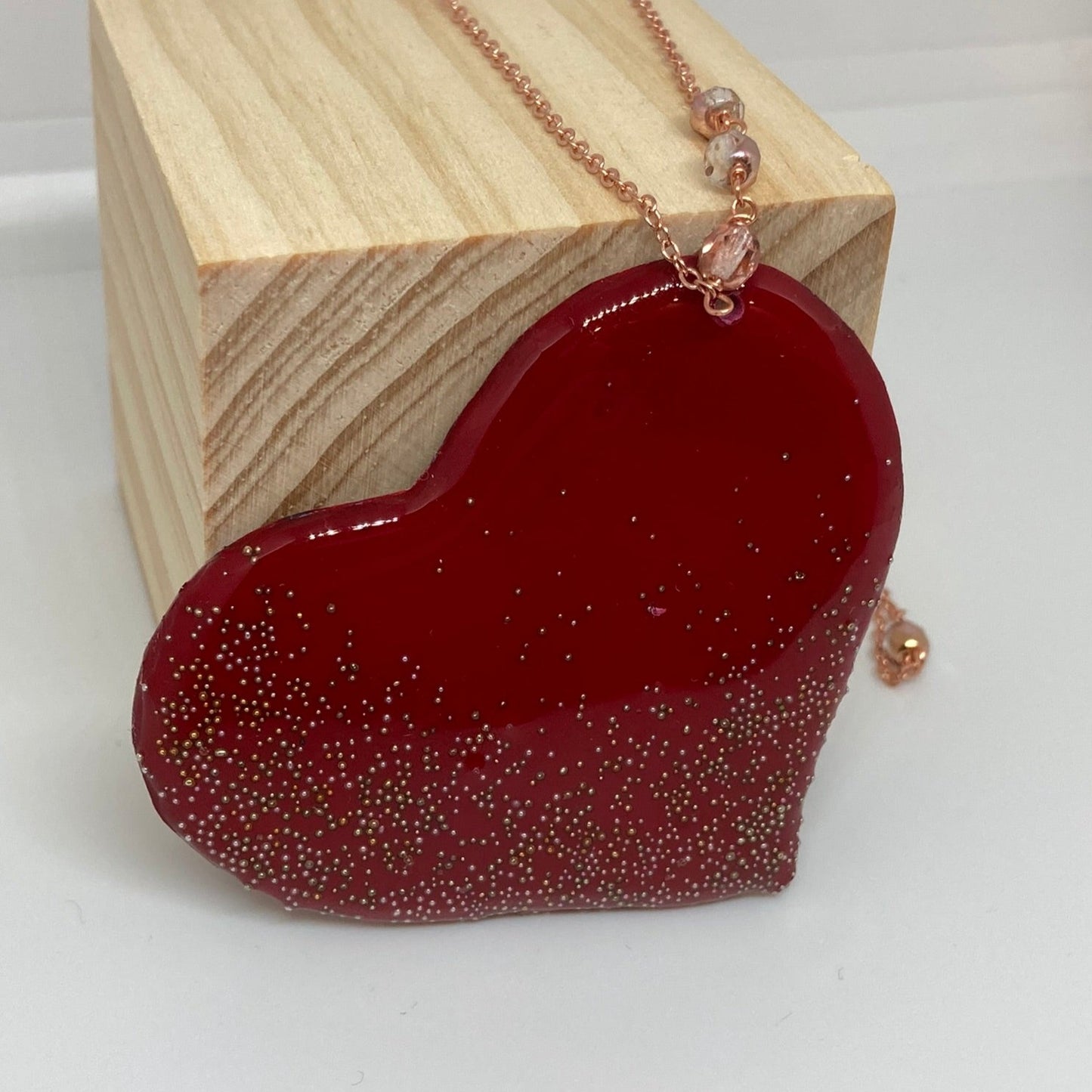 Copper necklace with square pendant, embellished with amethyst pearl.