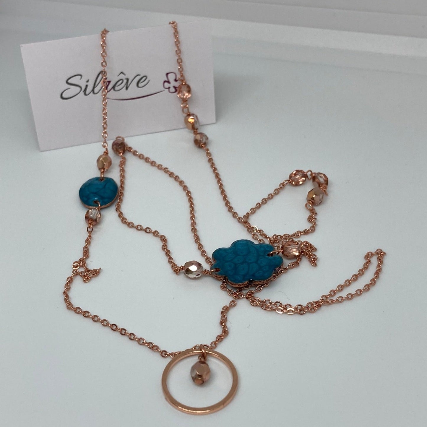 Copper necklace with hand painted and vitrified oval pendant.