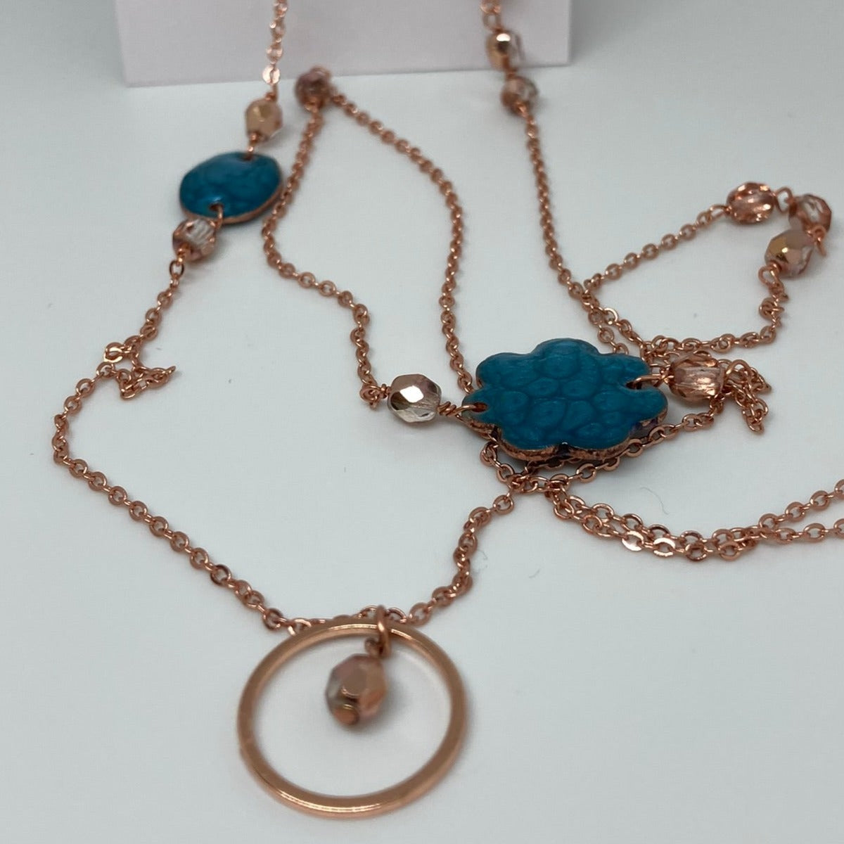 Copper necklace with hand painted and vitrified oval pendant.