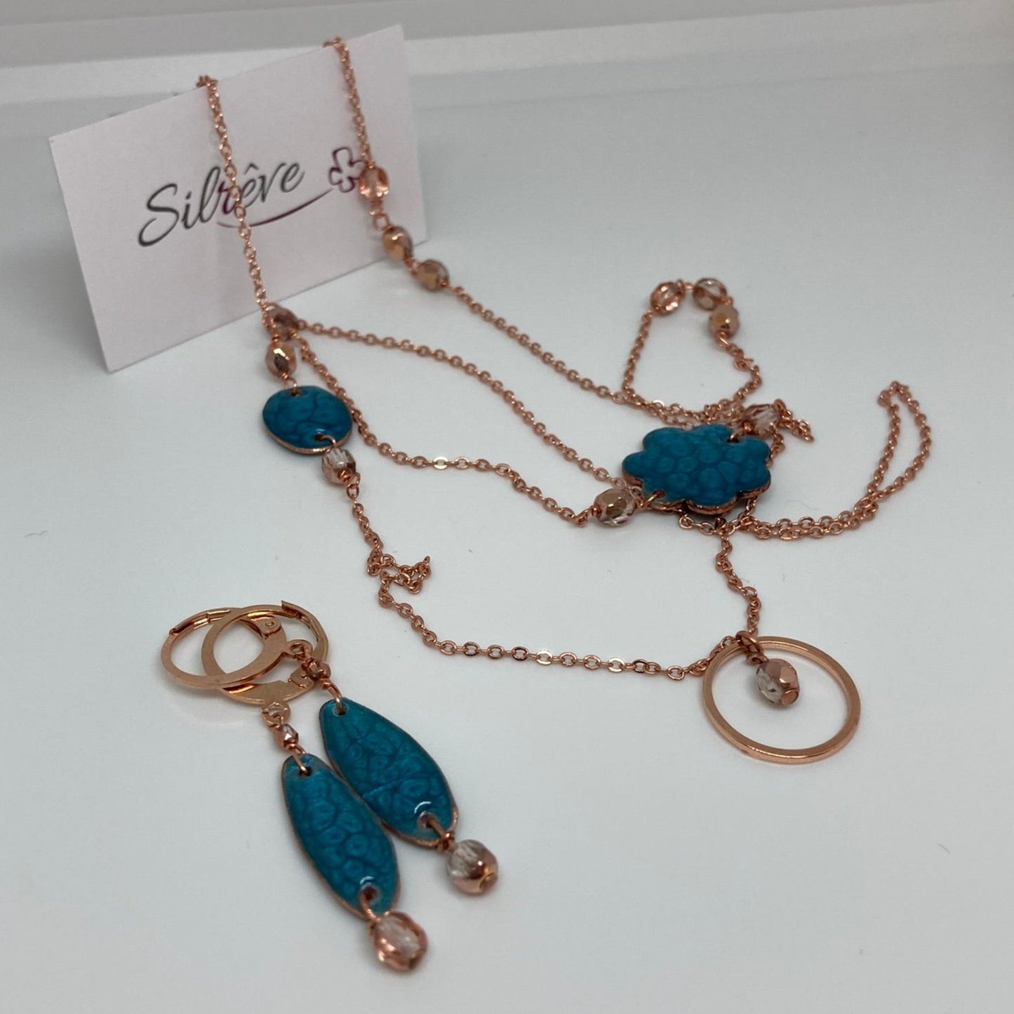 Copper necklace with hand painted and vitrified oval pendant.