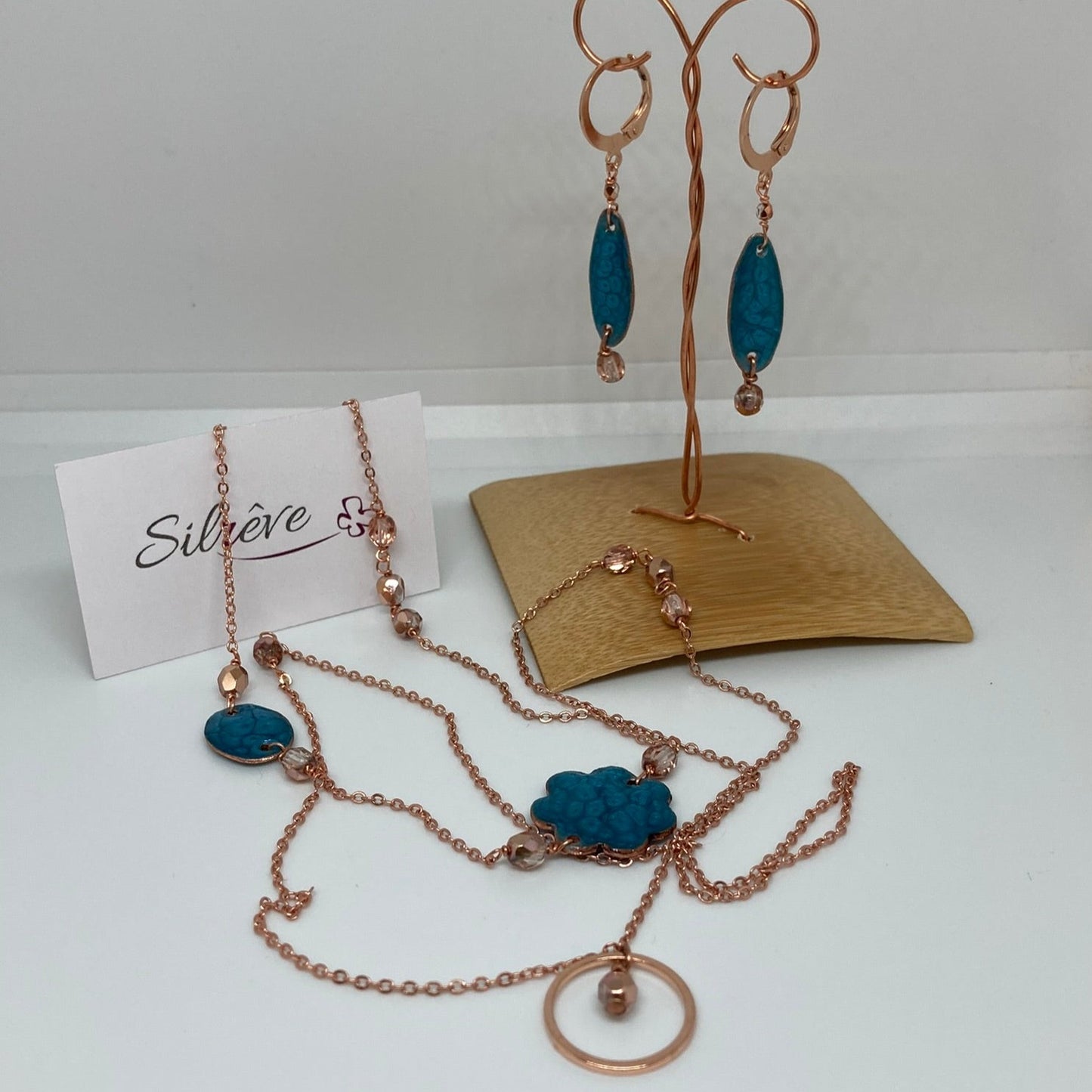 Copper necklace with hand painted and vitrified oval pendant.