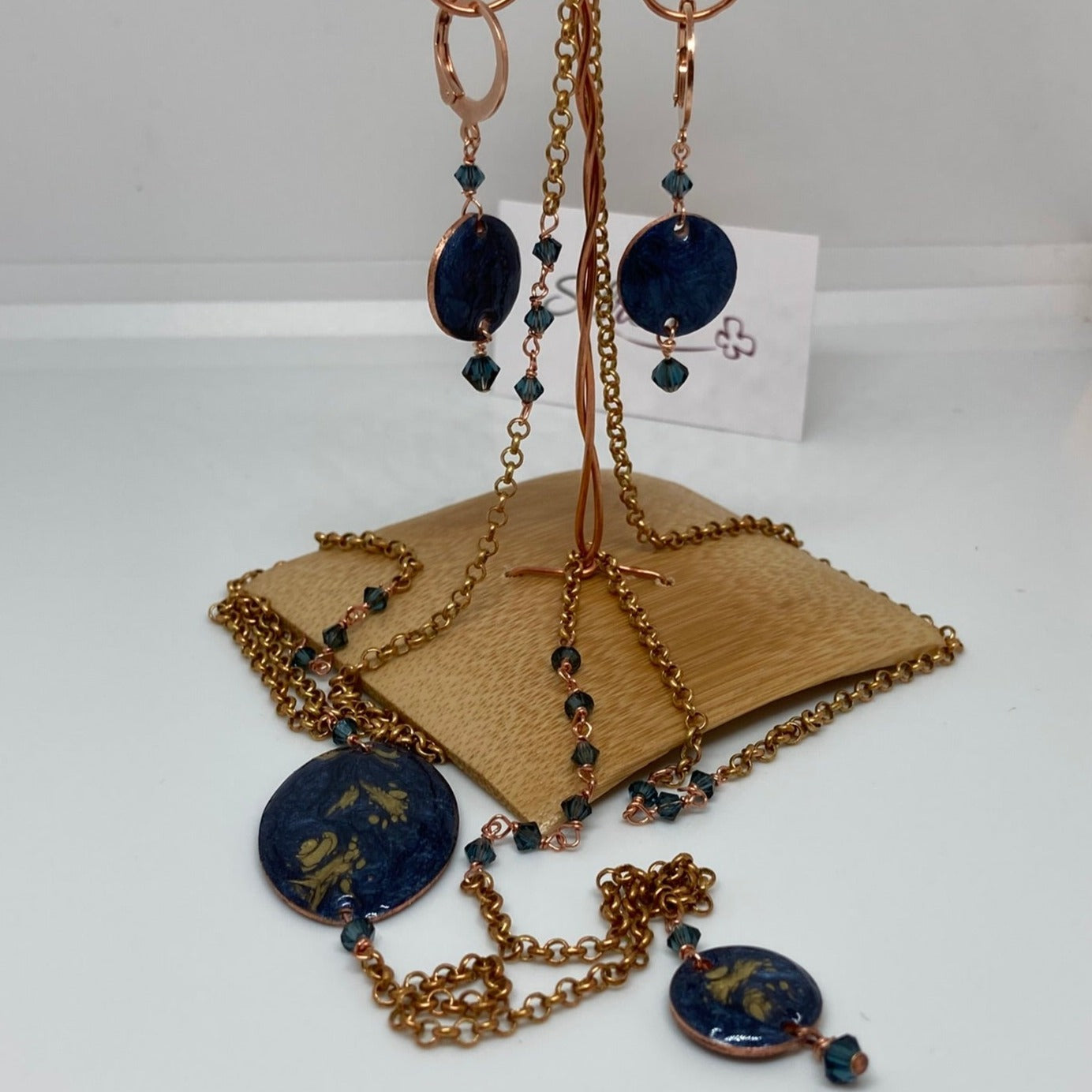 Copper necklace with hand painted and vitrified oval pendant.