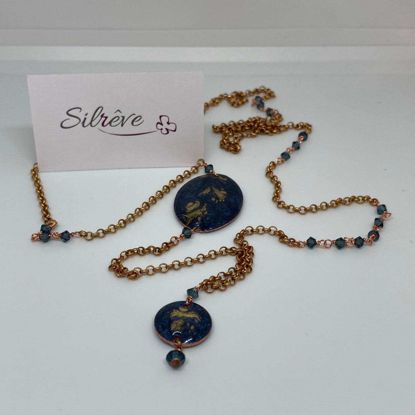 Copper necklace with hand painted and vitrified oval pendant.