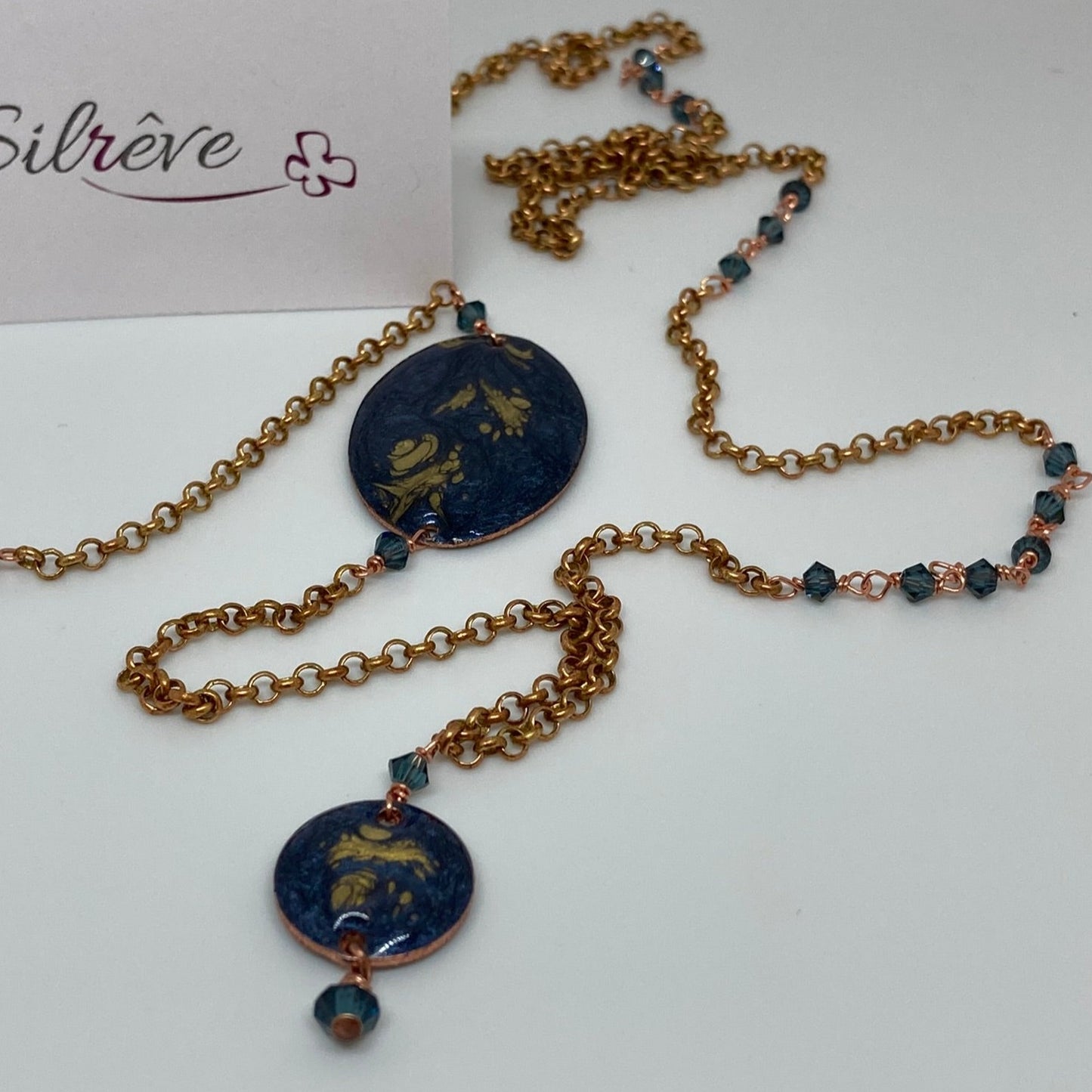 Copper necklace with hand painted and vitrified oval pendant.