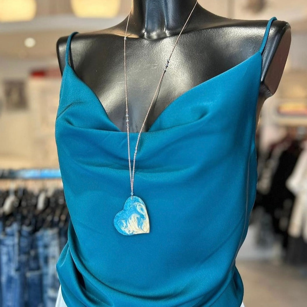 Copper necklace with square pendant, embellished with amethyst pearl.