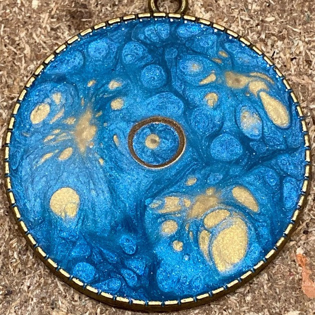 Bronze necklace with hand painted and vitrified round pendant.