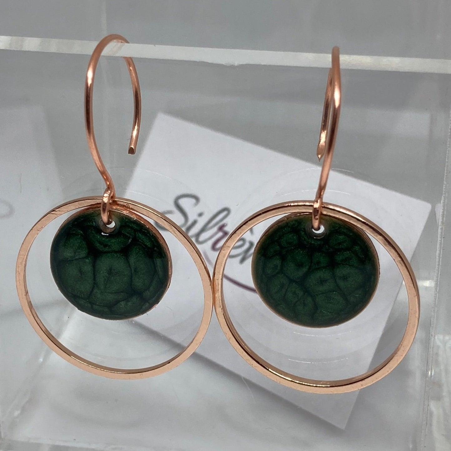 Round concentric pendant earrings, in copper