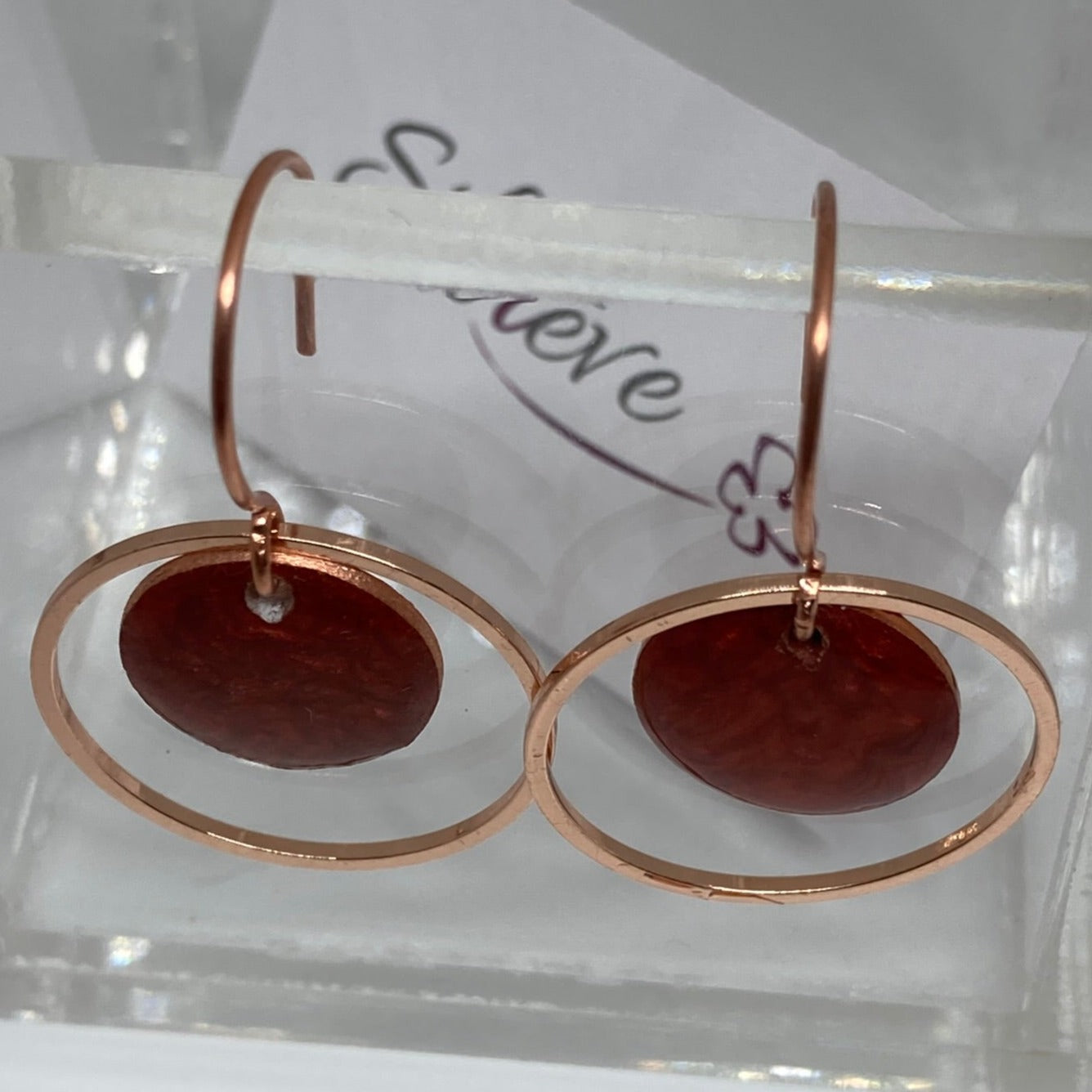 Round concentric pendant earrings, in copper