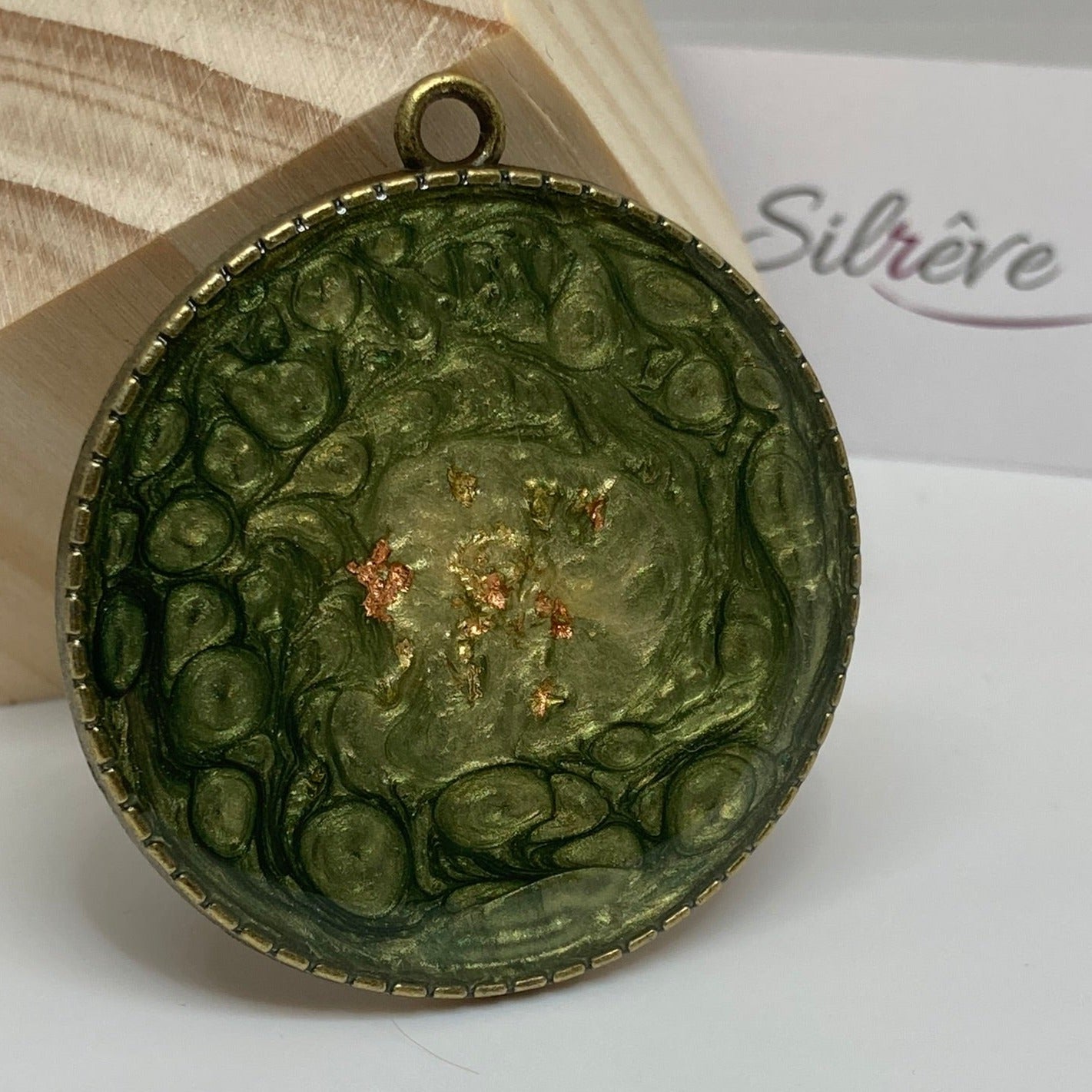 Bronze necklace with hand painted and vitrified round pendant.