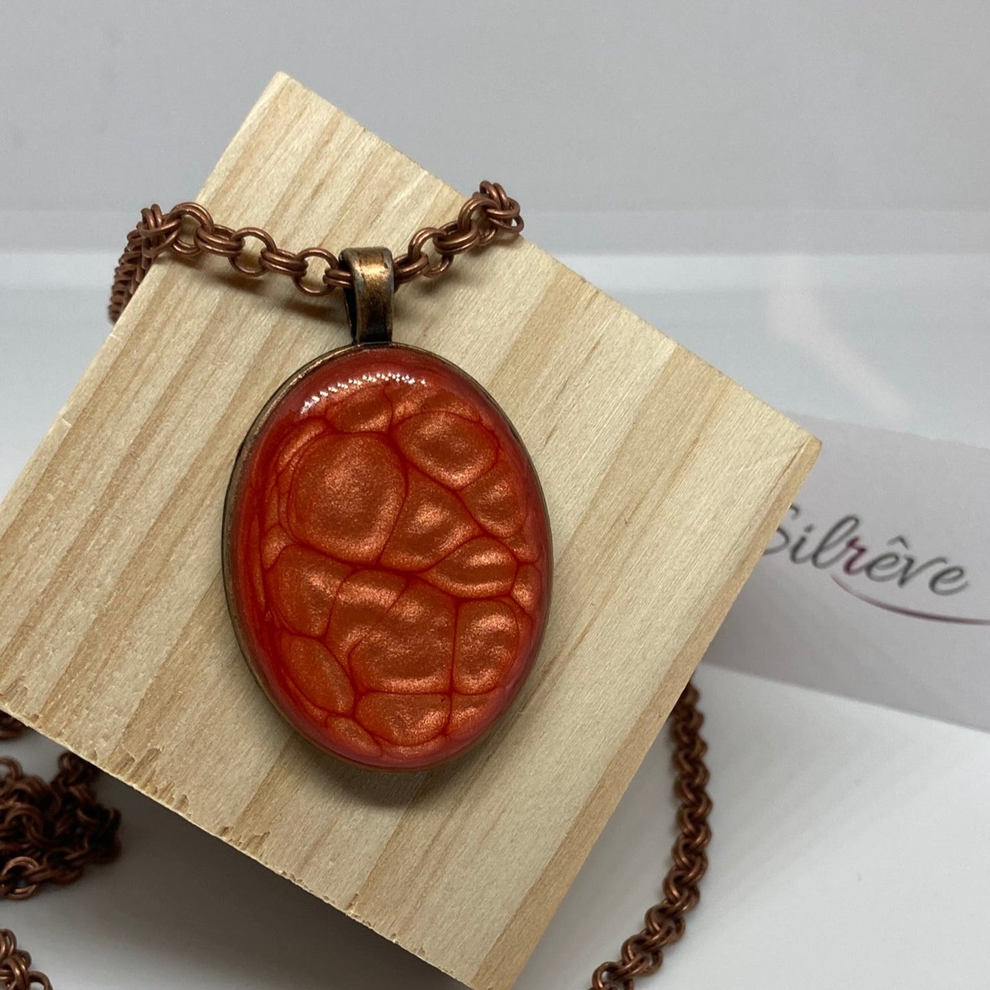 Copper necklace with hand painted and vitrified oval pendant.