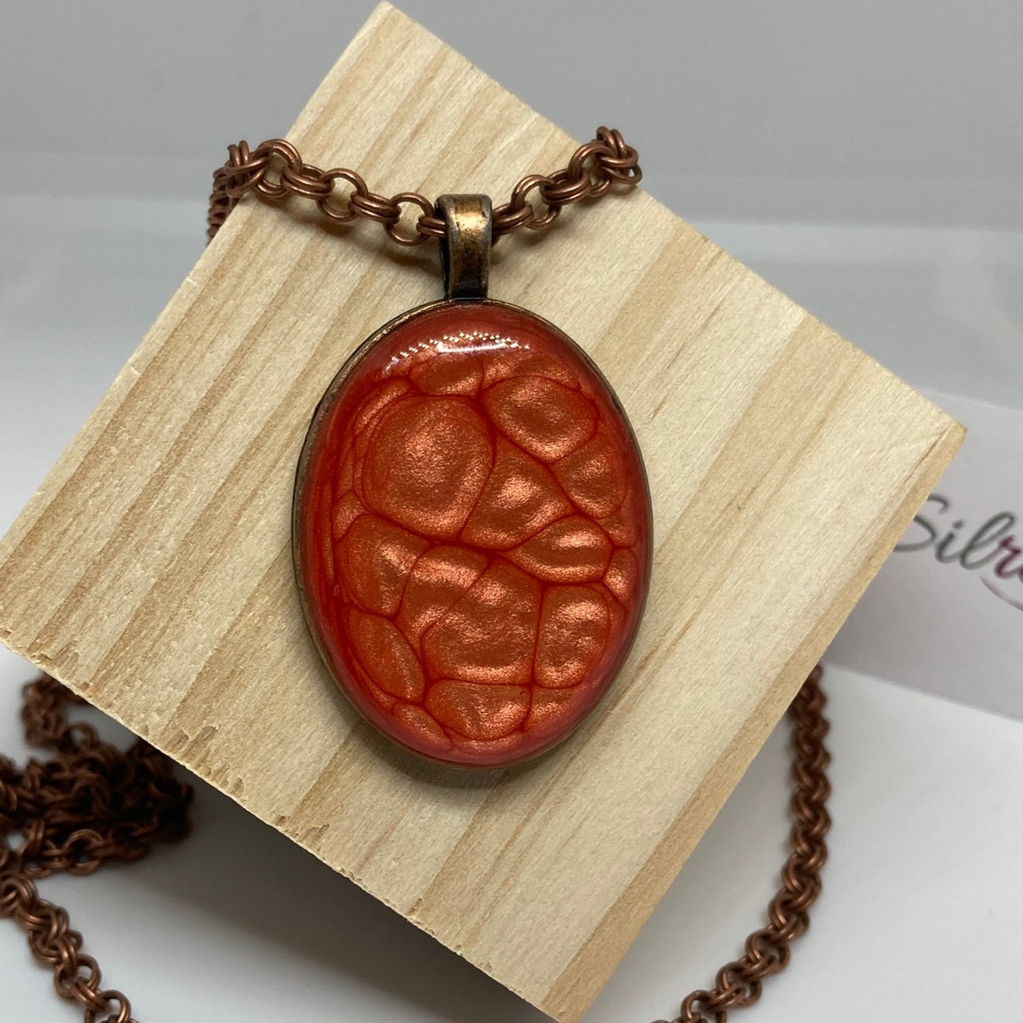 Copper necklace with hand painted and vitrified oval pendant.